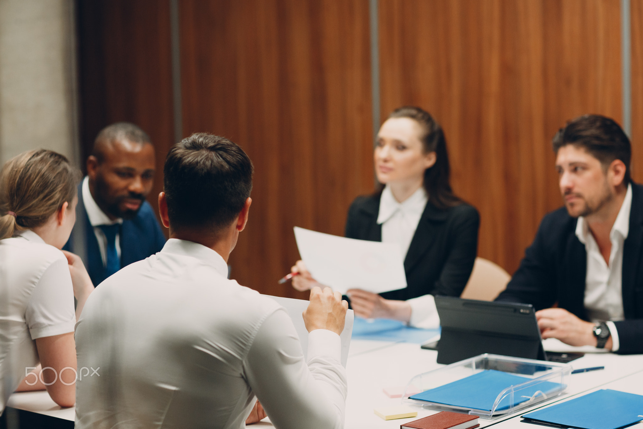 Businessman and businesswoman team at office meeting. Business people