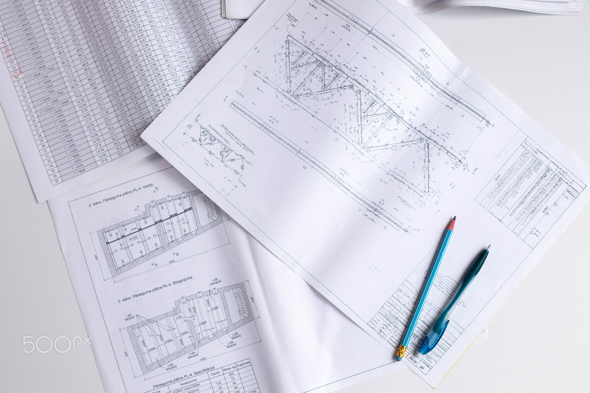 drawings of a construction engineer on a sheet of paper