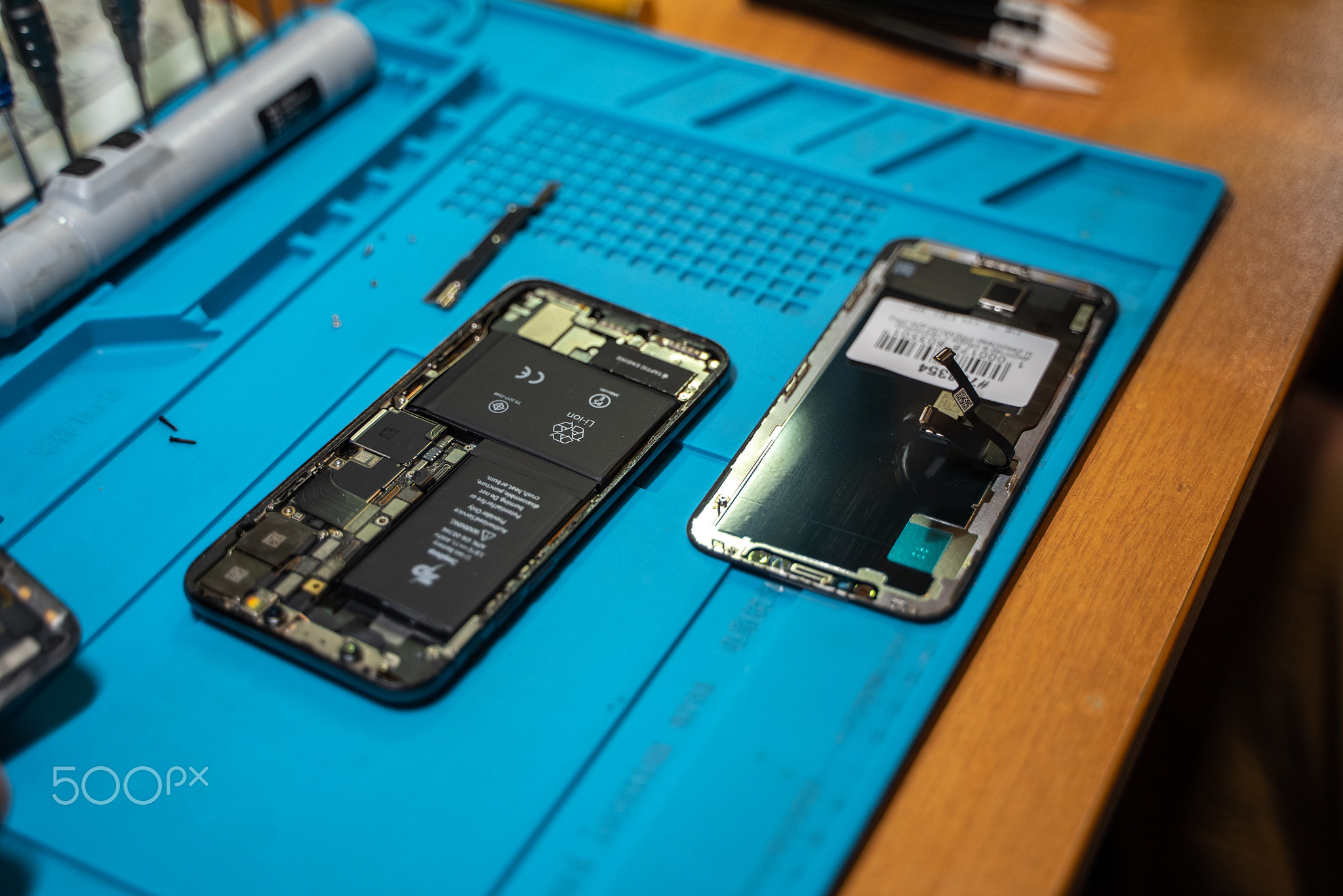 Disassembled smartphone, two parts decks, top and bottom