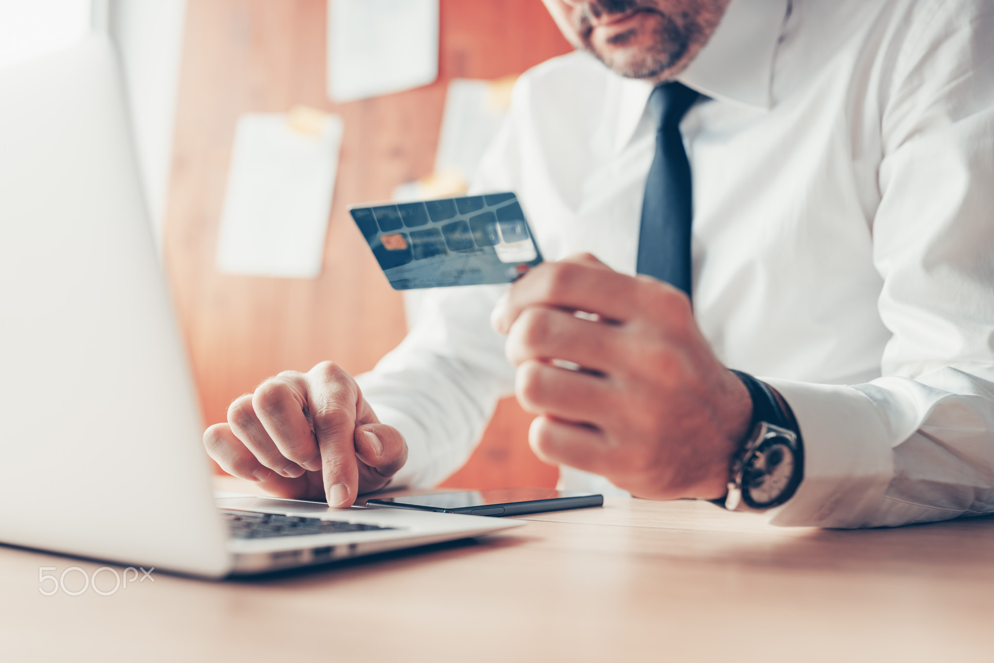 E-business, businessman using credit card