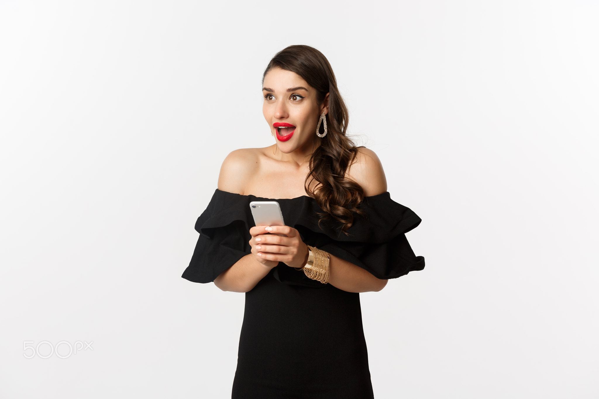 Image of excited woman in black glamour dress, red lipstick, using