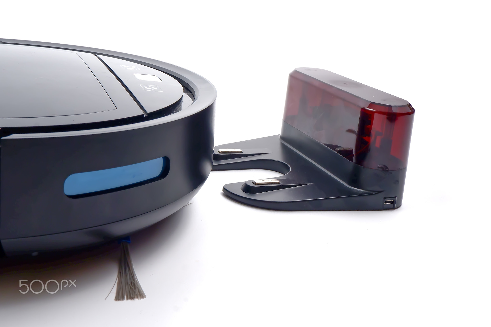 the robot smart vacuum cleaner comes to the base for charging