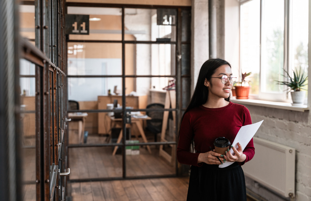 beautiful woman working in the office by Cristian Negroni on 500px.com