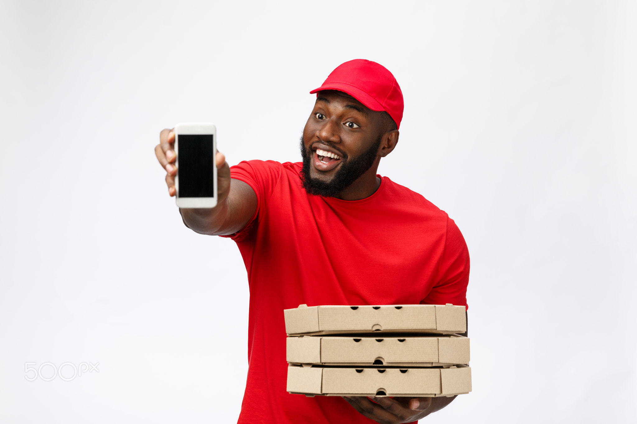 Delivery Concept: Handsome african pizza delivery man talking to