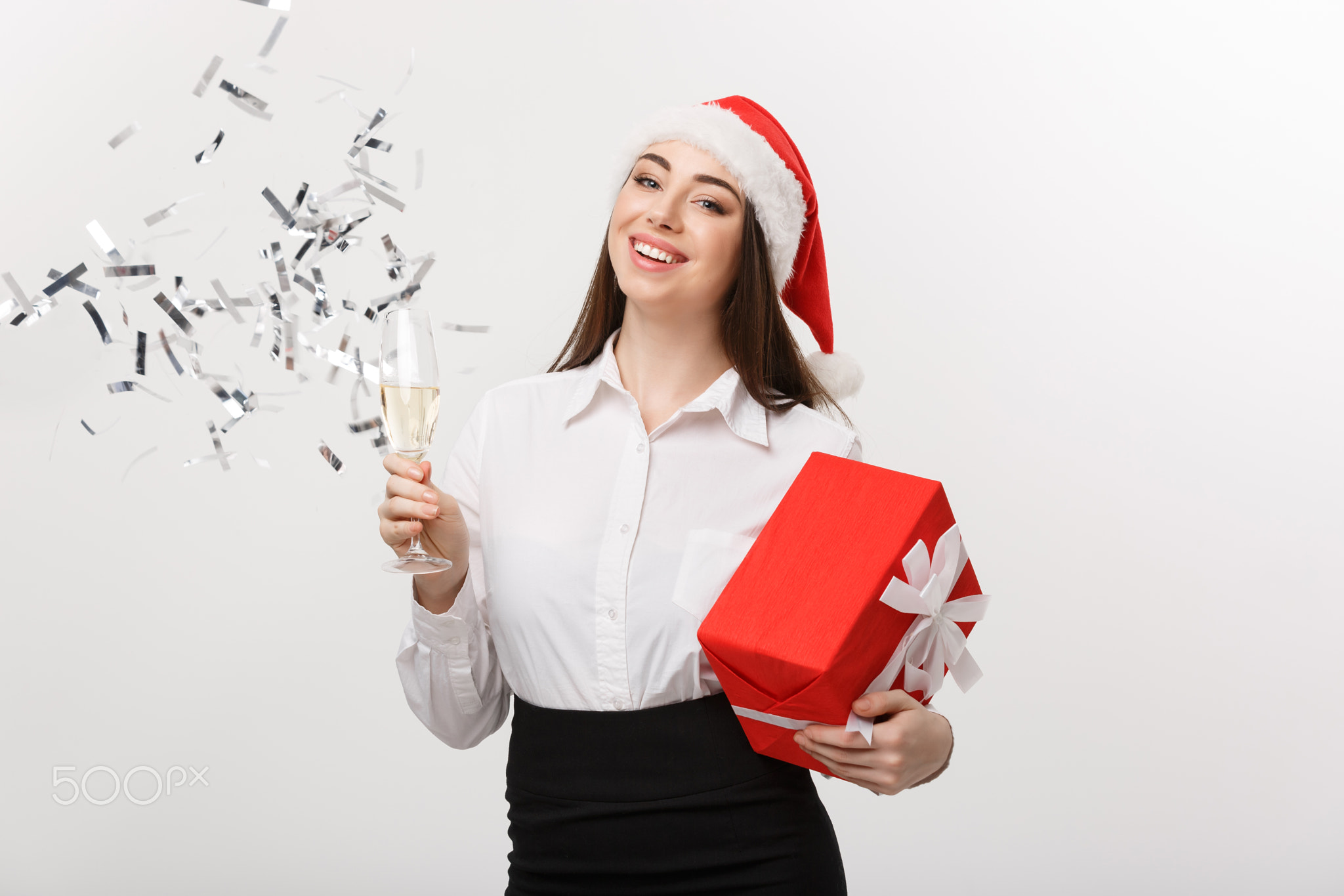 Christmas Celebration - Young beautiful business woman celebrating