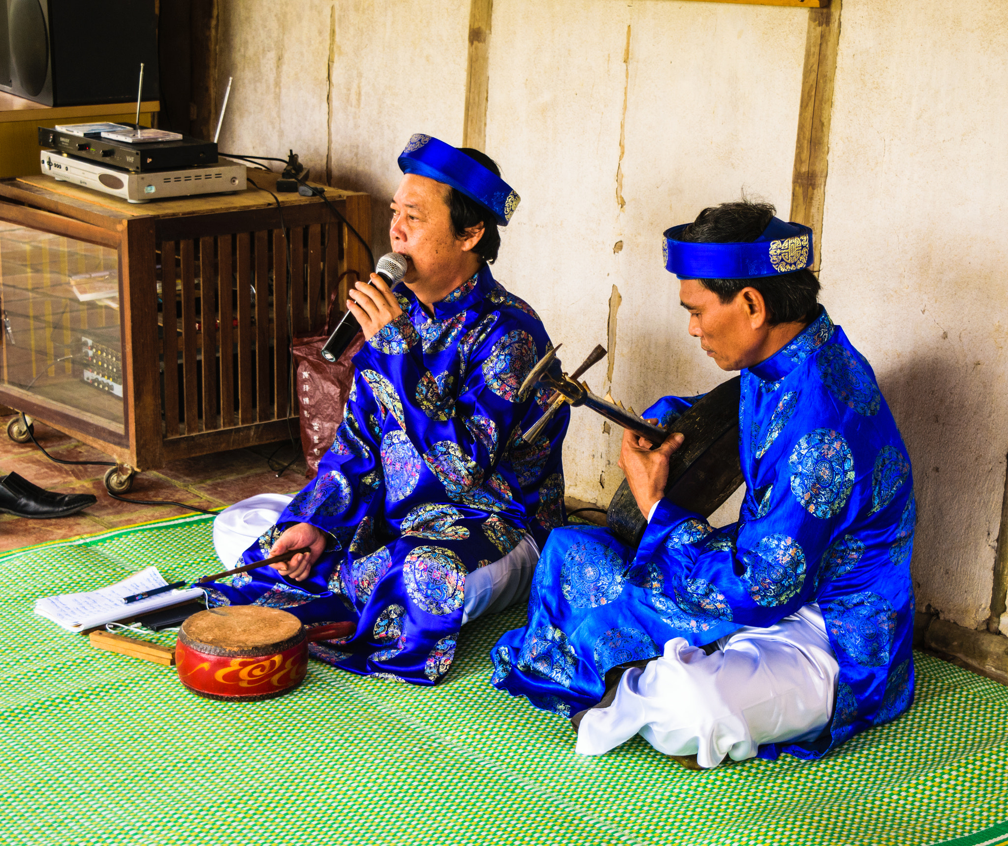 Vietnamese musicians are playing old traditional music in Citadel of the Ho