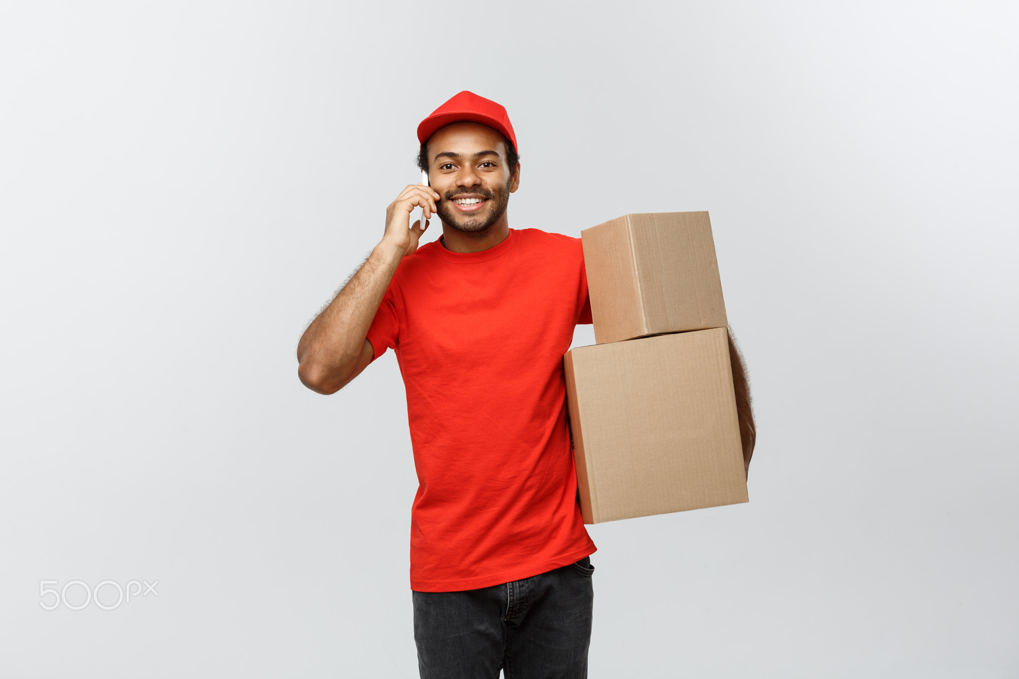 Delivery Concept - Portrait of Handsome African American delivery man