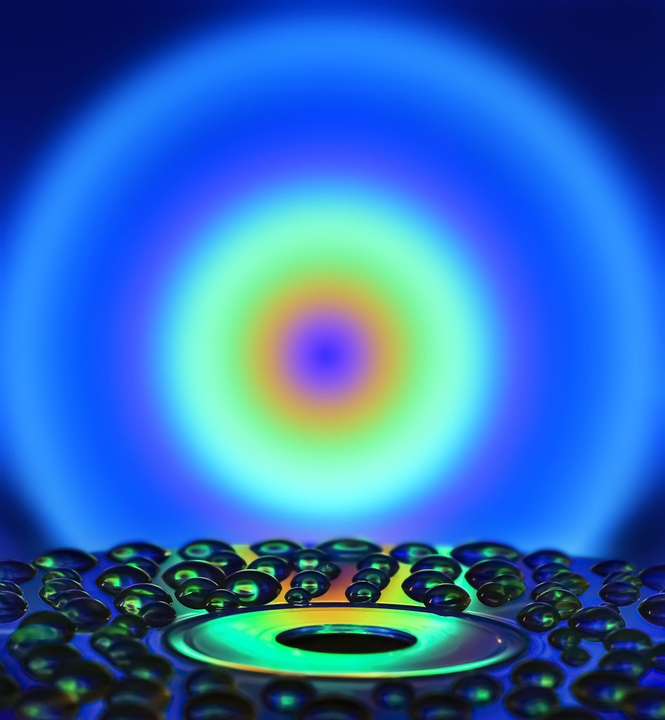 close-up of water drop on a CD by Nino Di Grazia on 500px.com