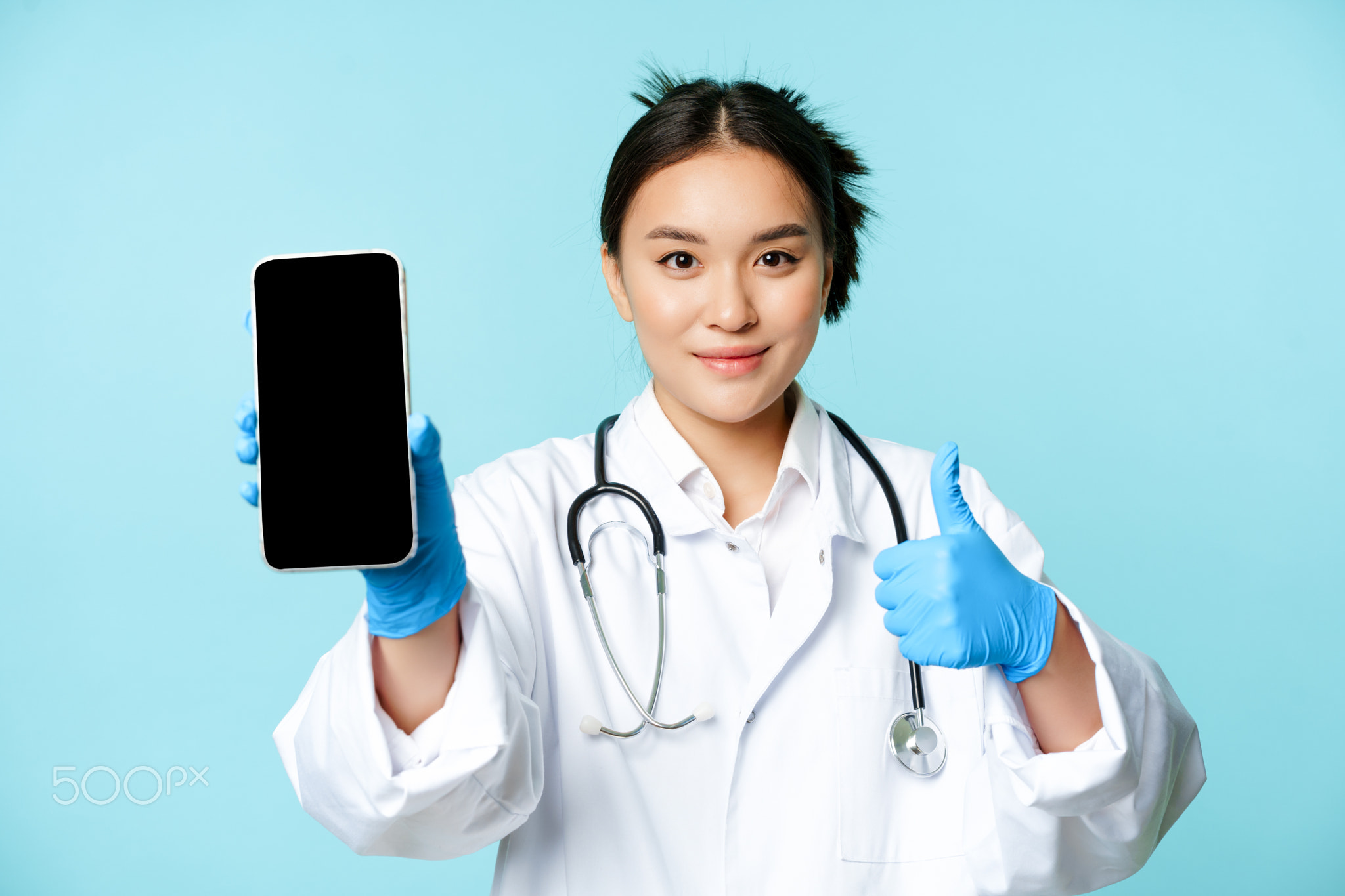 Web healthcare, online help concept. Confident asian female doctor or