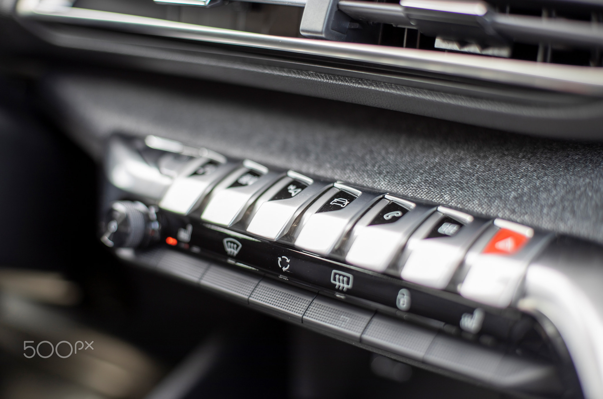 multimedia control console and climate in a modern car. close-up