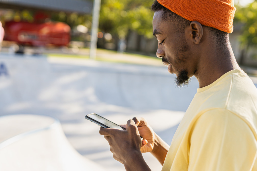Young male skateboarder at skate park by Fabio Formaggio on 500px.com