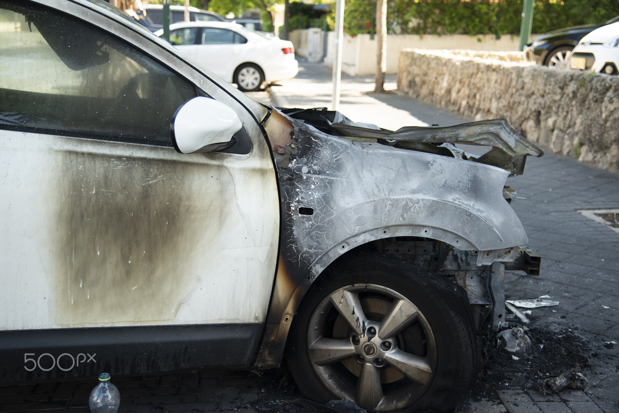 ISRAEL, Tel Aviv - 15 May 2021: Vandalism or revenge, burnt car. The