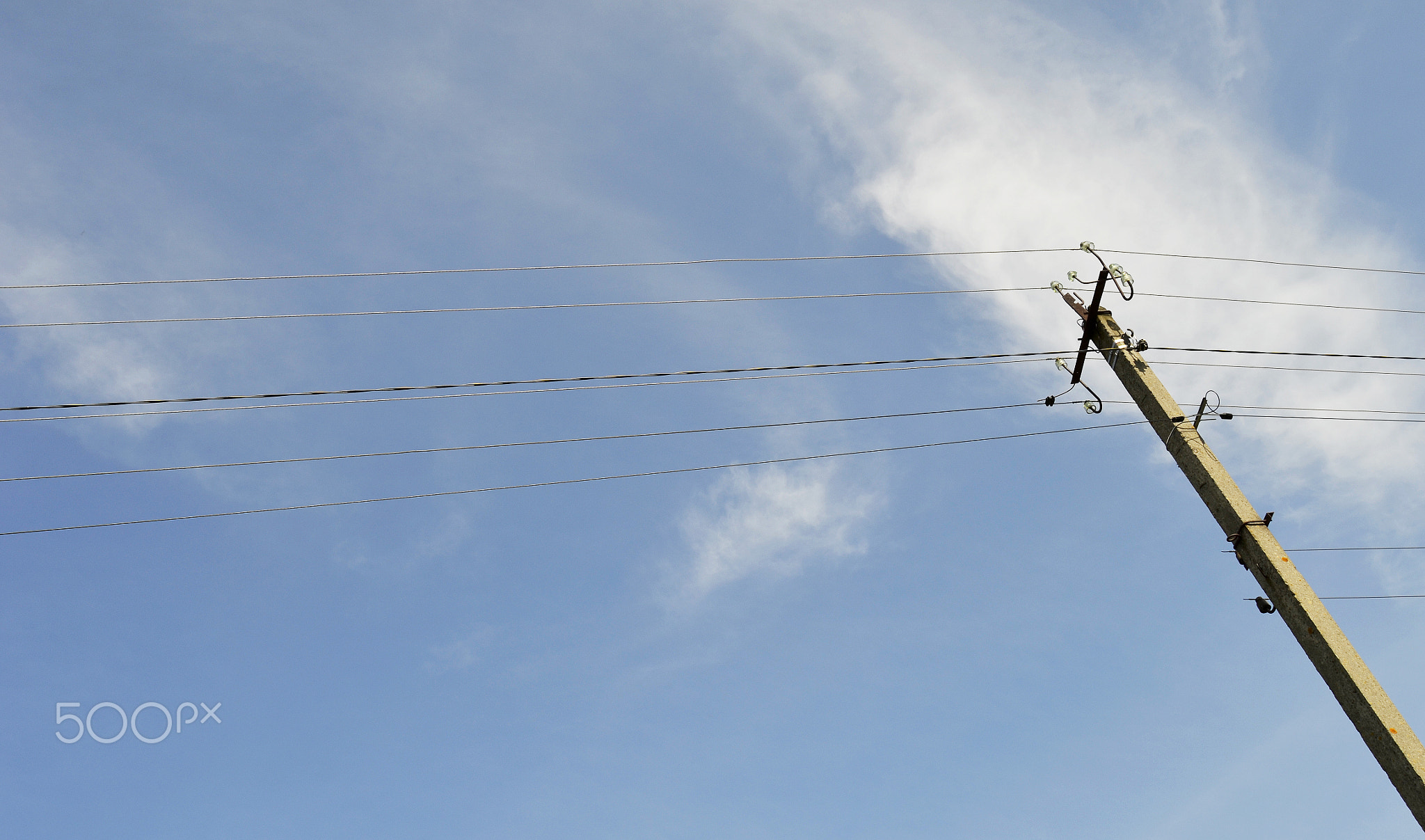 Power electric pole with line wire on colored background close up