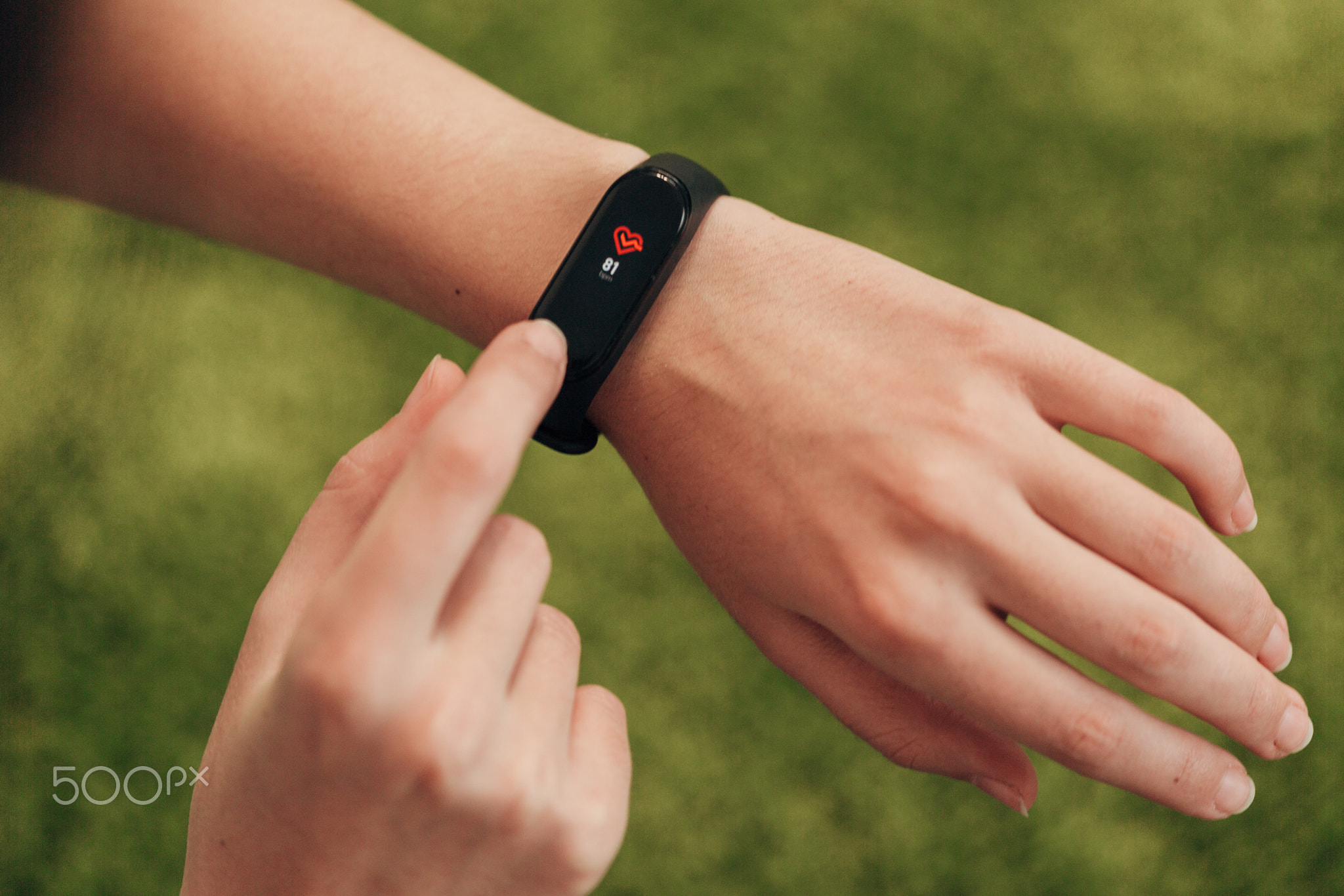 Smart Watch on a Human Hand. Heartbeat check.
