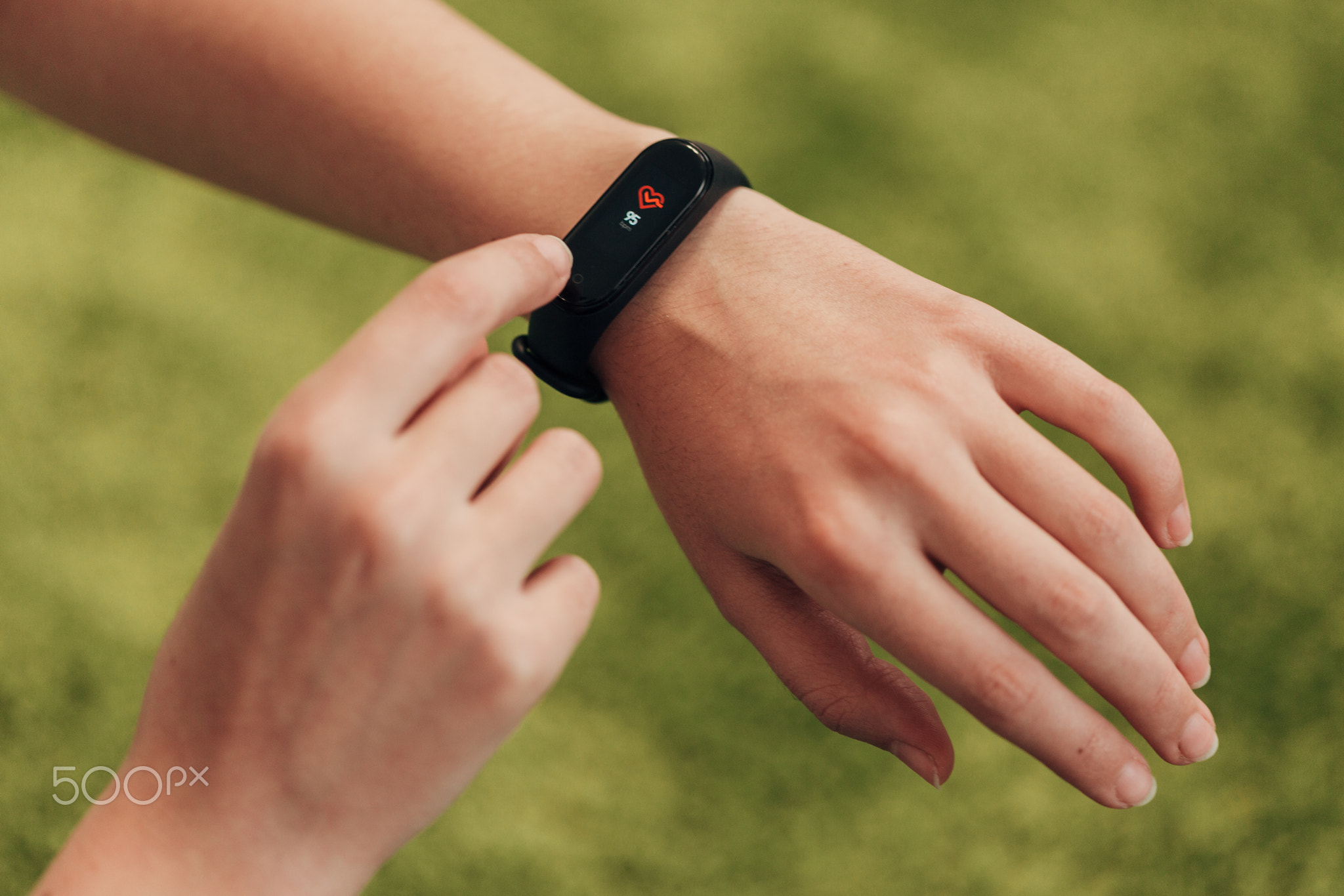 Smart watch on the hand. Measuring heart rate.