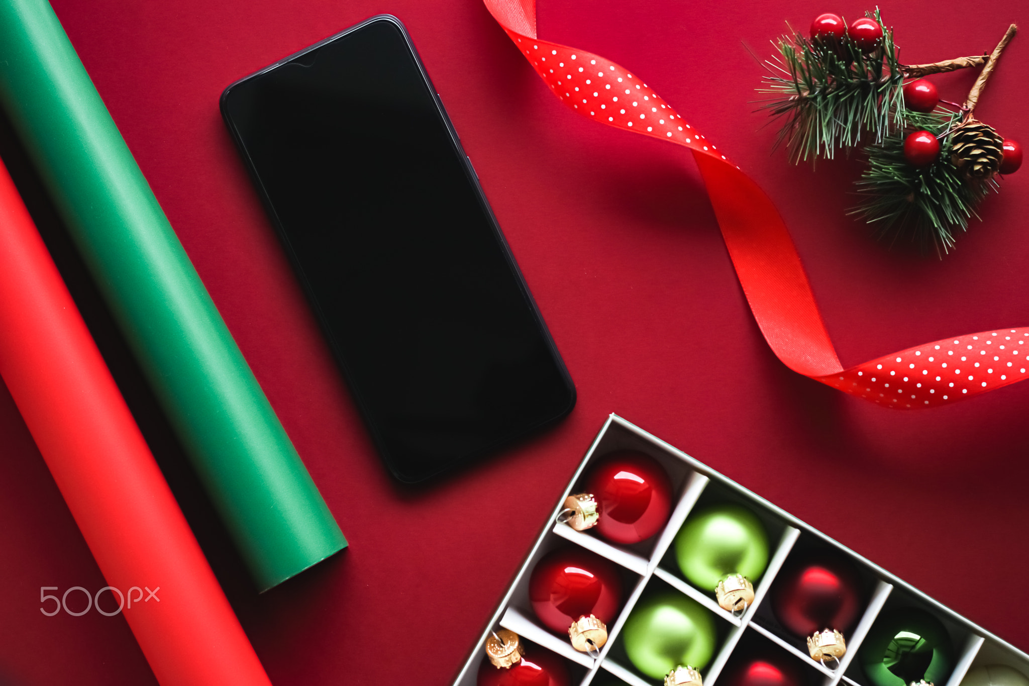 Christmas phone app and holiday message concept. Smartphone with blank