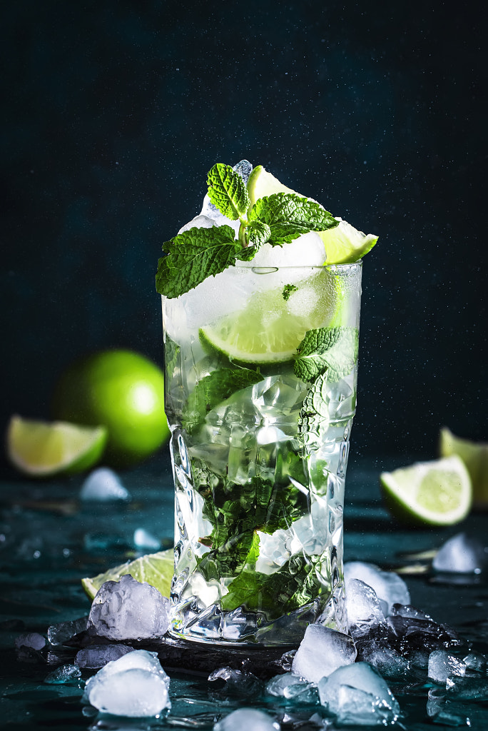Mojito cocktail with lime, white rum, soda, cane sugar, mint, and ice by 5PH on 500px.com