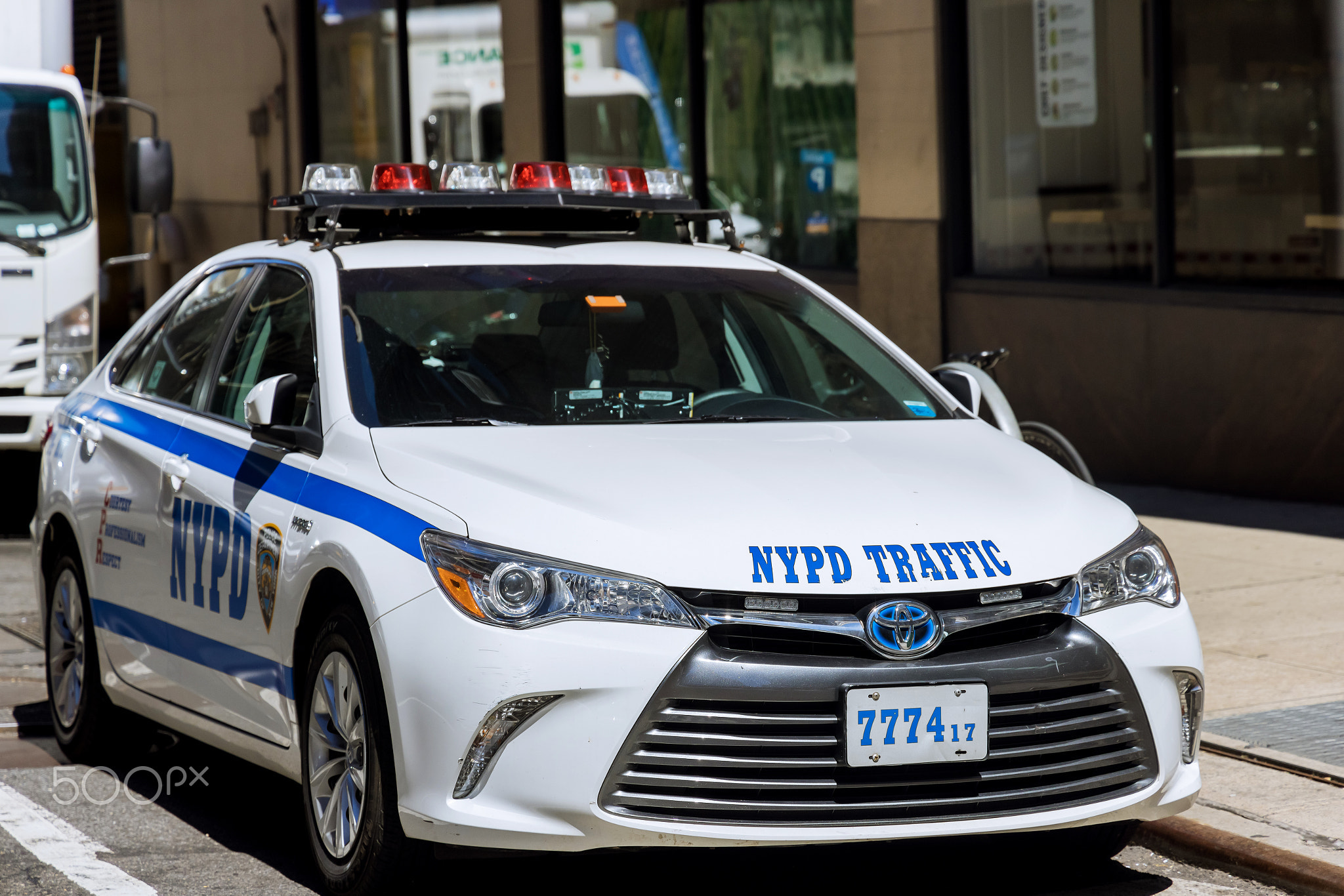 New York City NYPD Police car with sirens at day on street