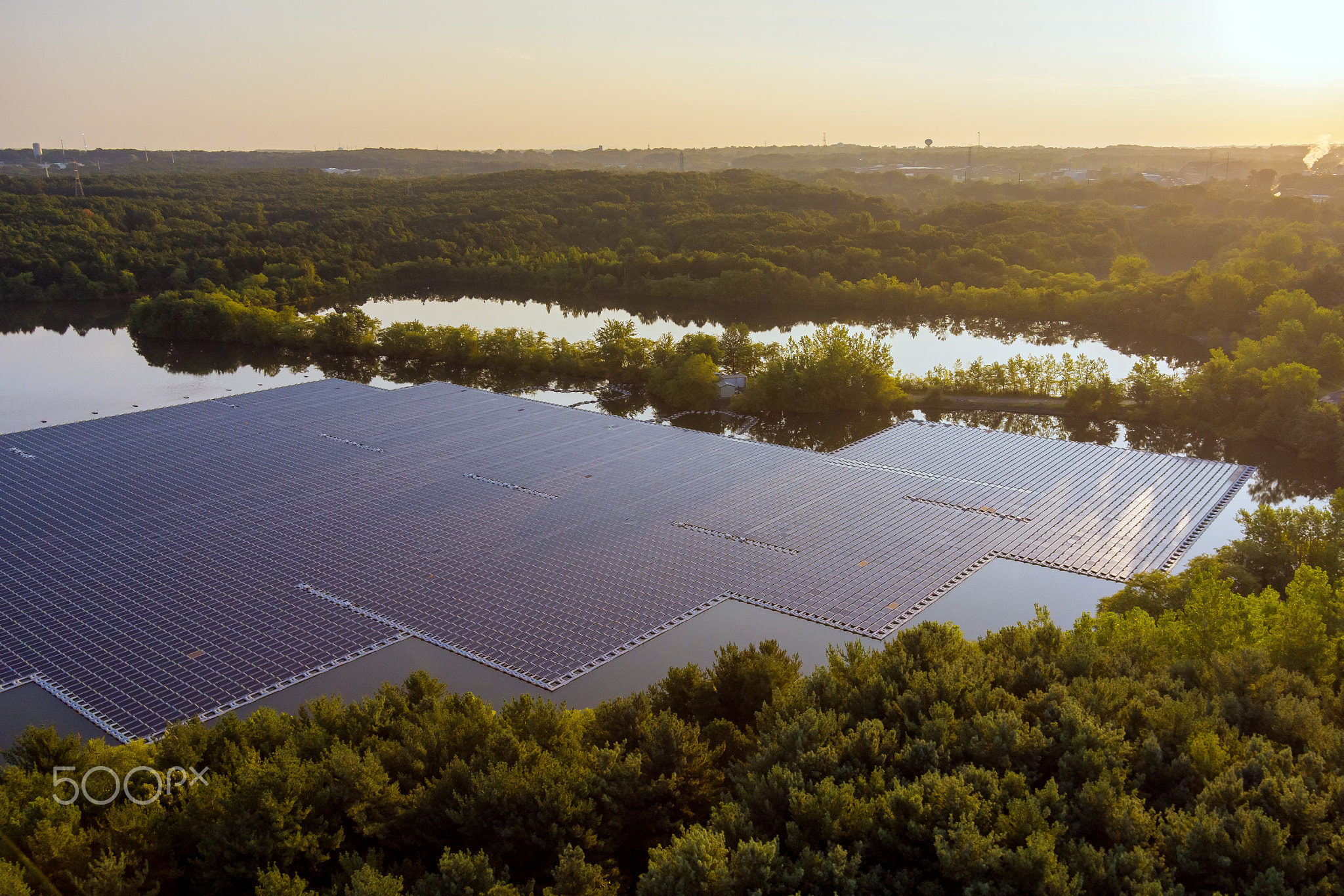 Aerial view of floating solar panels platform system on the lake