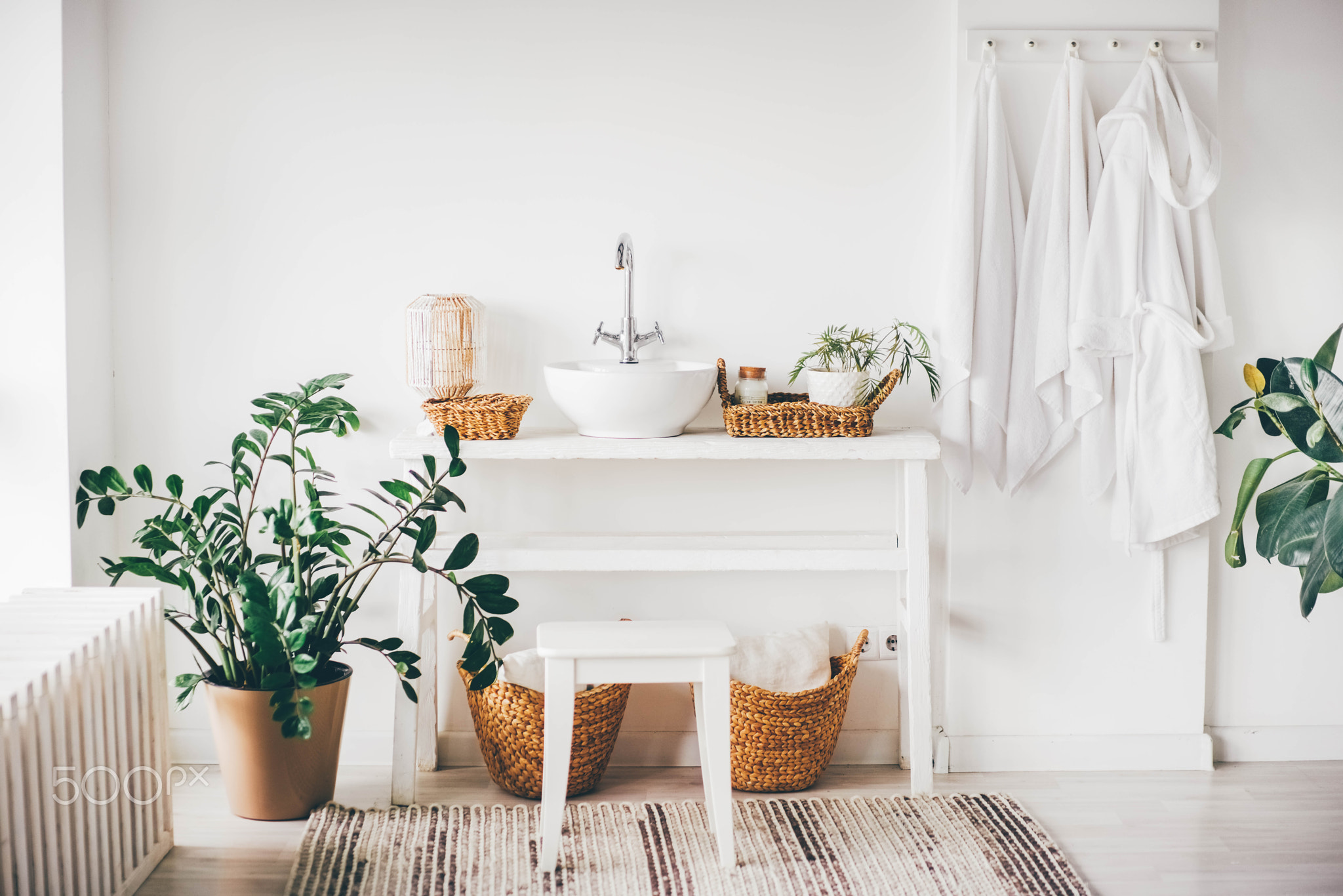Boho style bathroom white interior. 