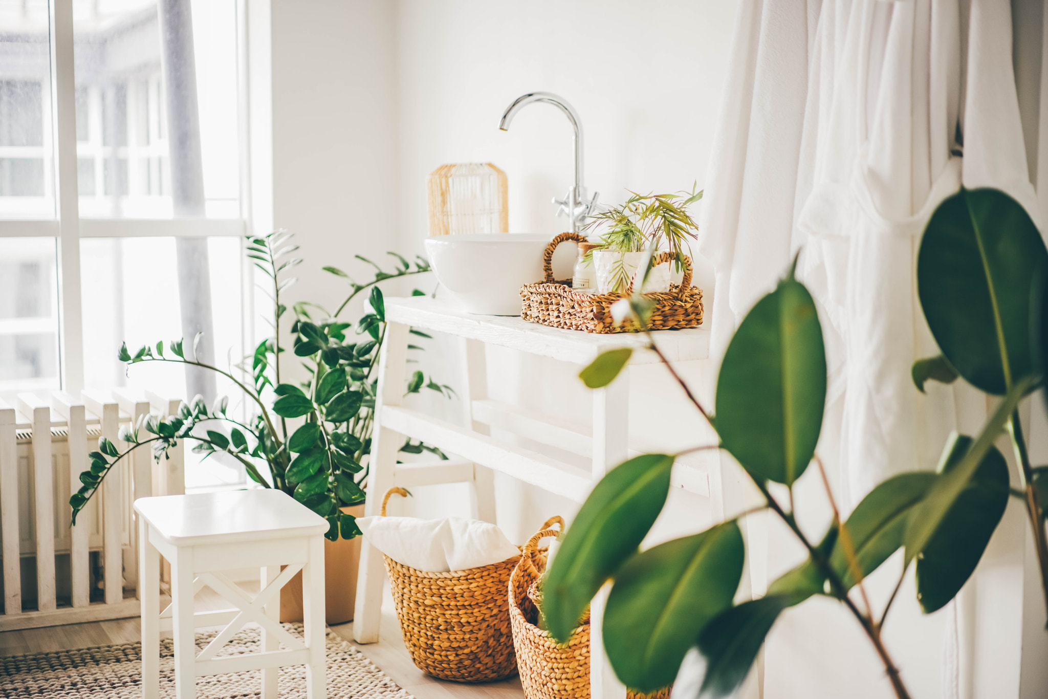 Boho style white bathroom interior. 