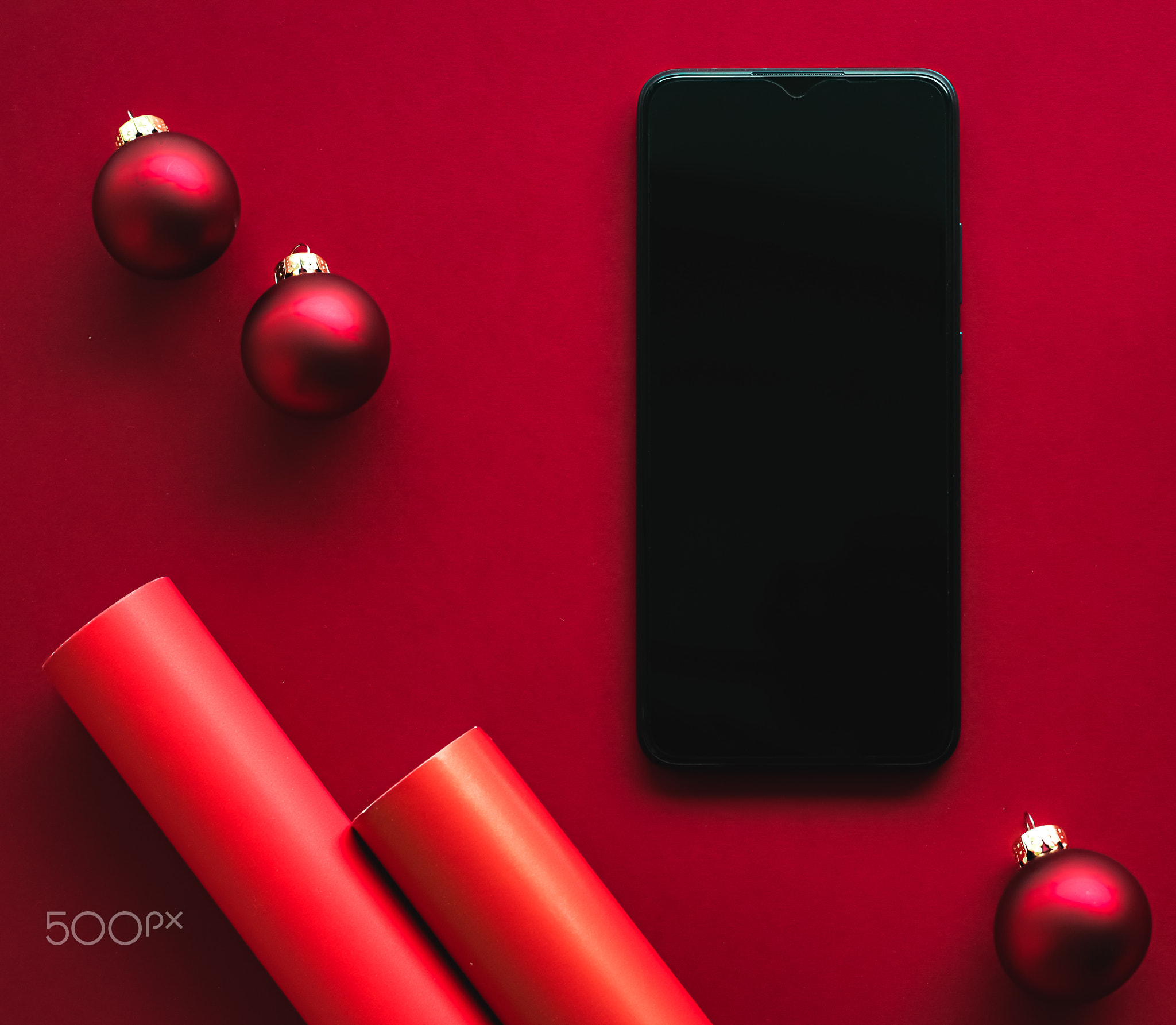 Christmas phone app and holiday message concept. Smartphone with blank