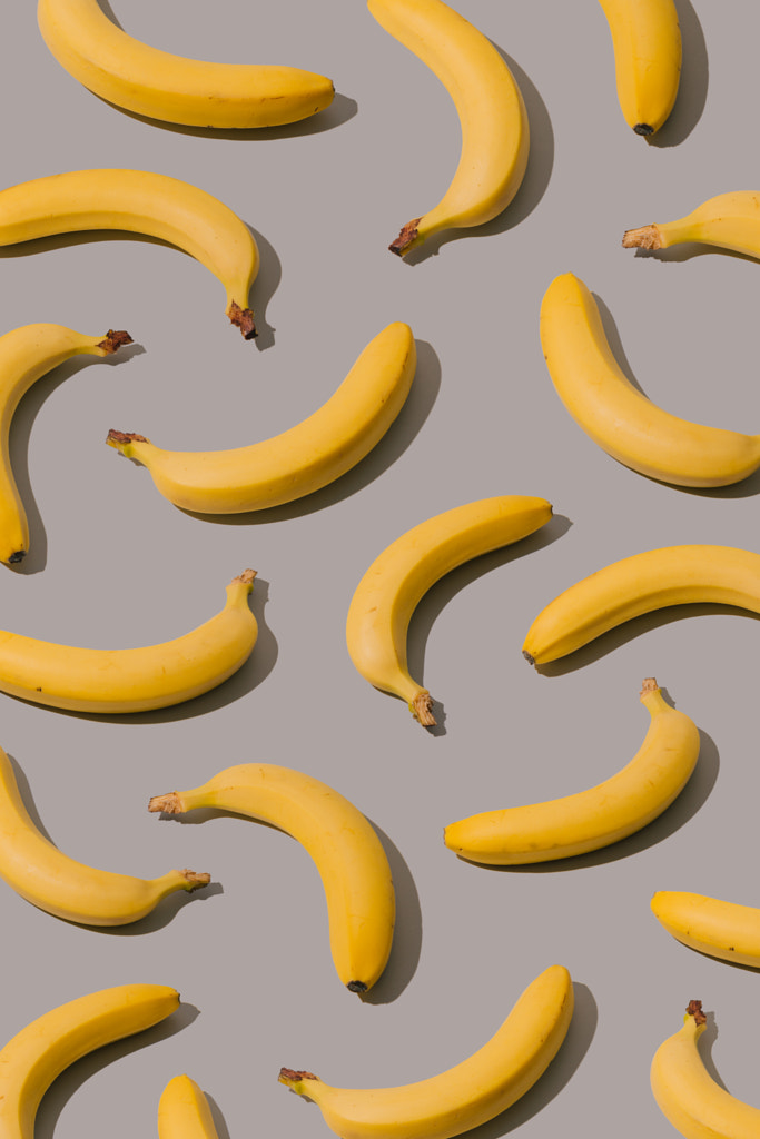 Bananas pattern on a gray background by Ilija Perkovic on 500px.com