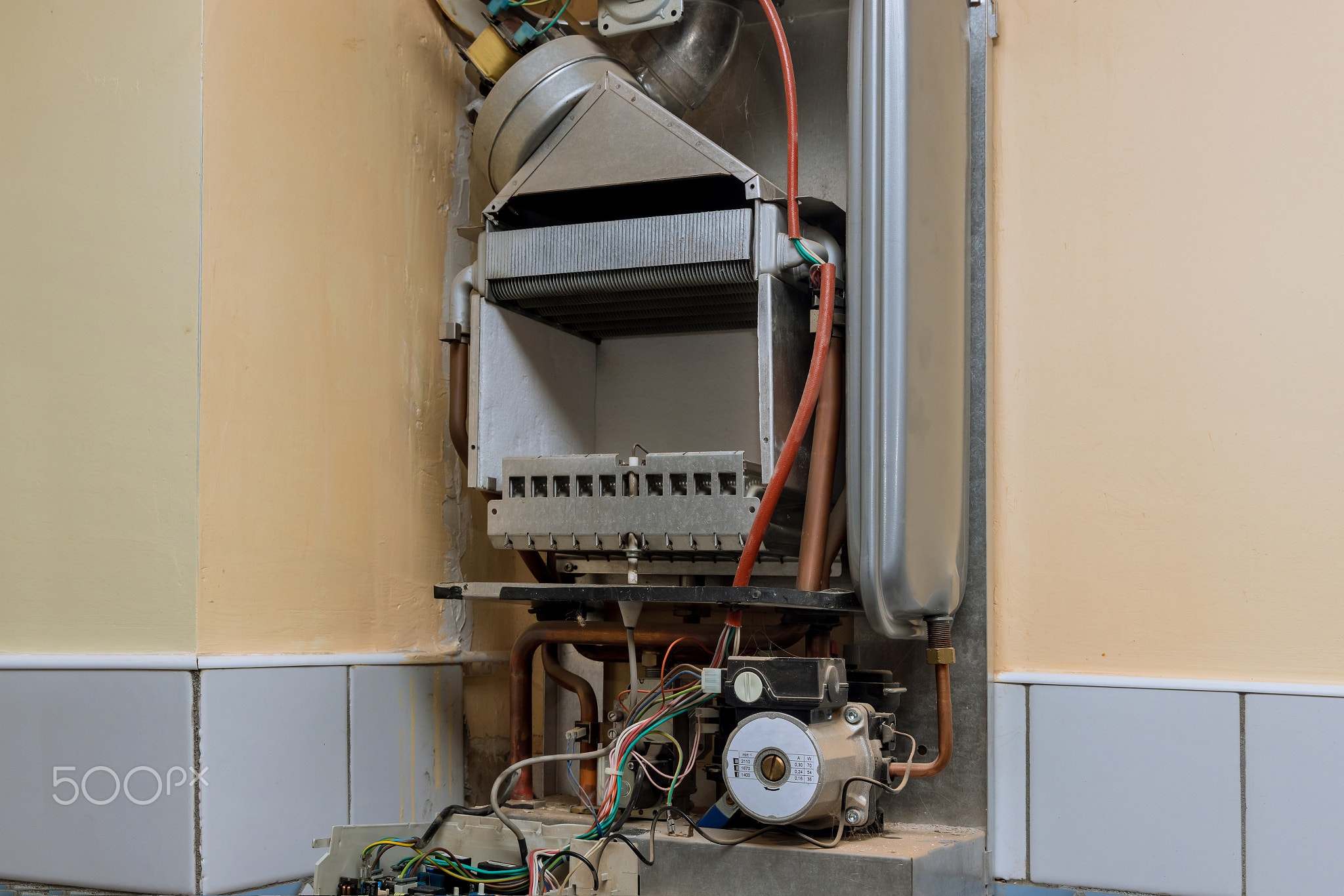 Setting up and servicing by heating systems installer