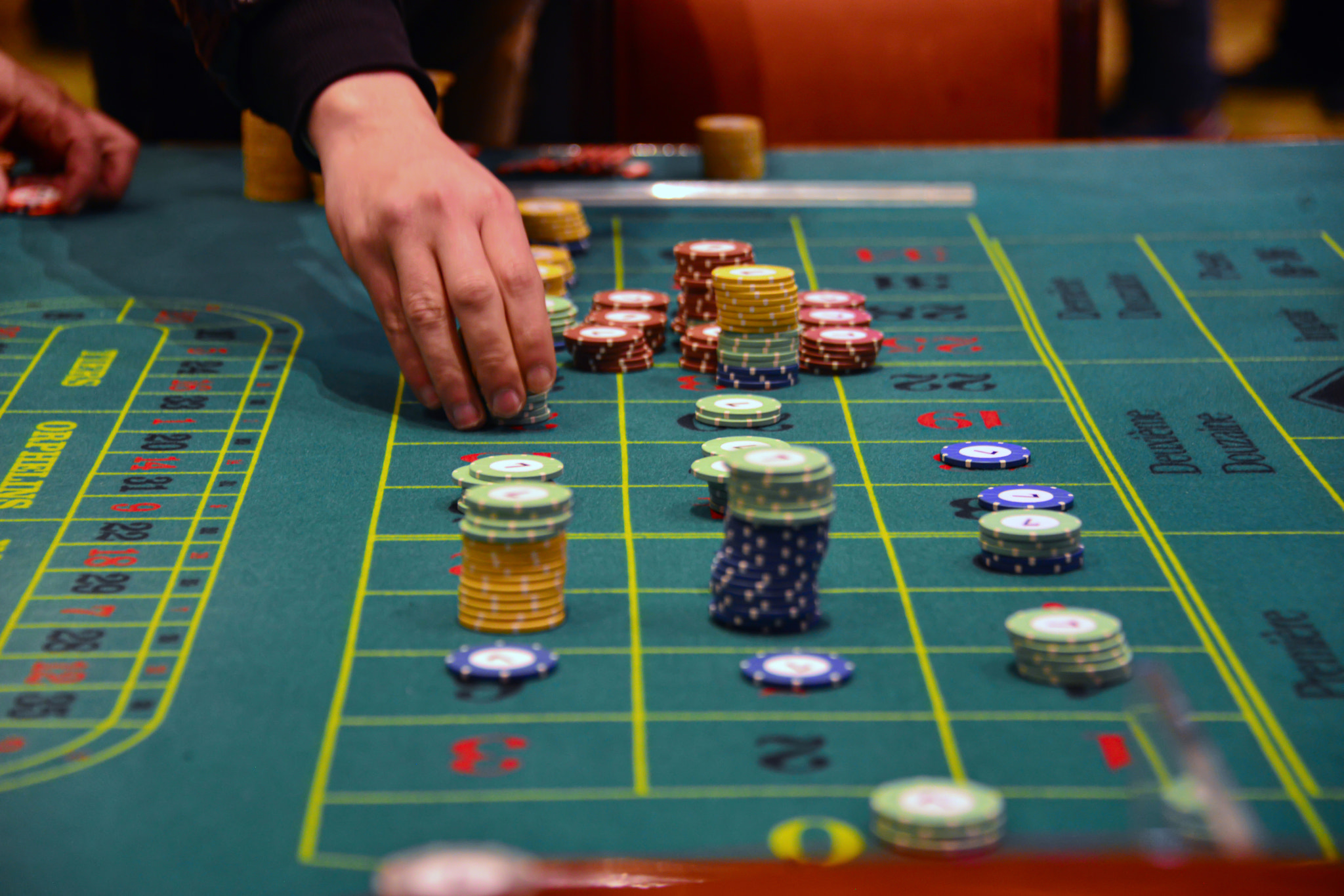 People playing poker in the casino, roulette, gambling.