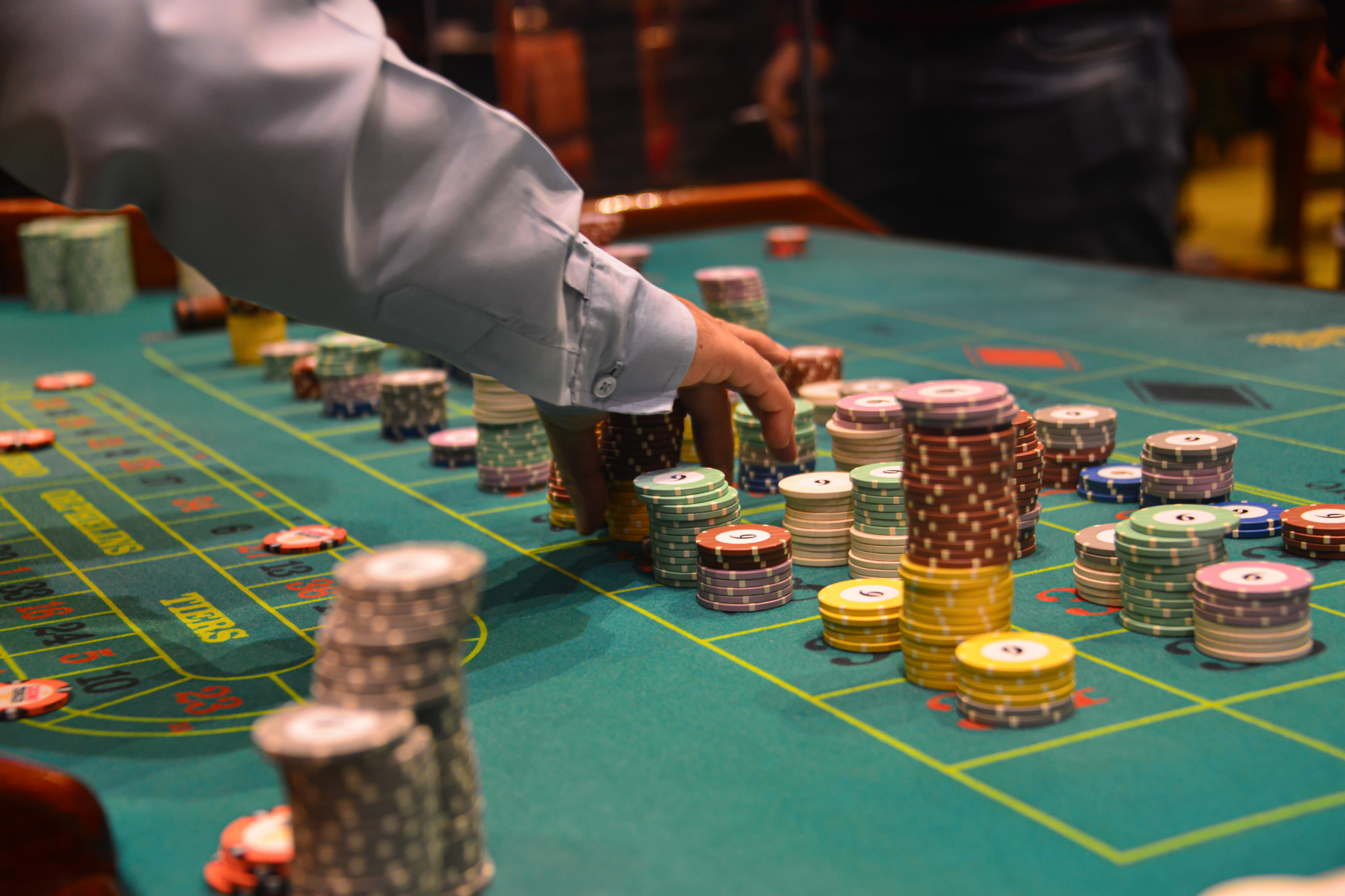 People playing poker in the casino, roulette, gambling.