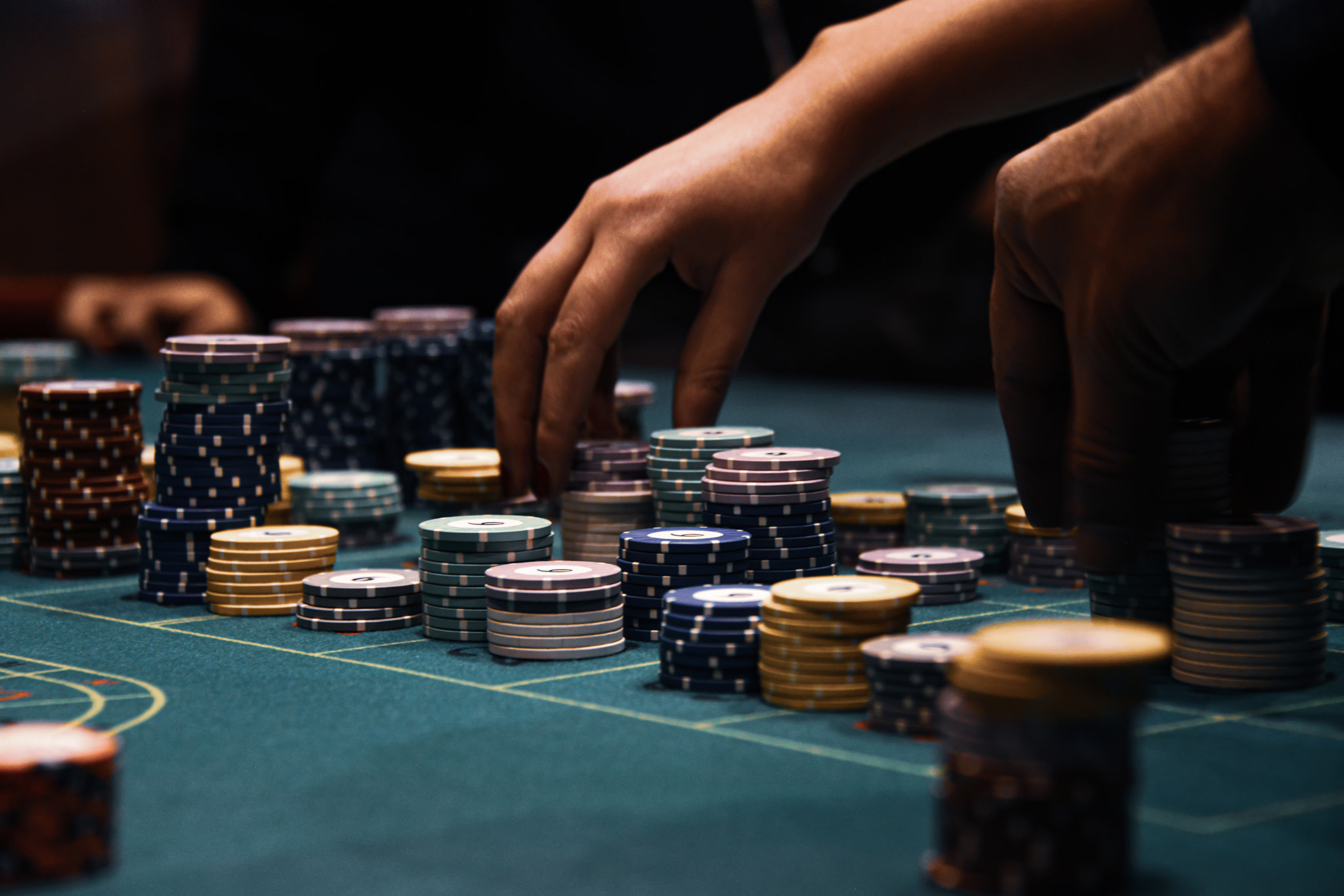 People playing poker in the casino, roulette, gambling.