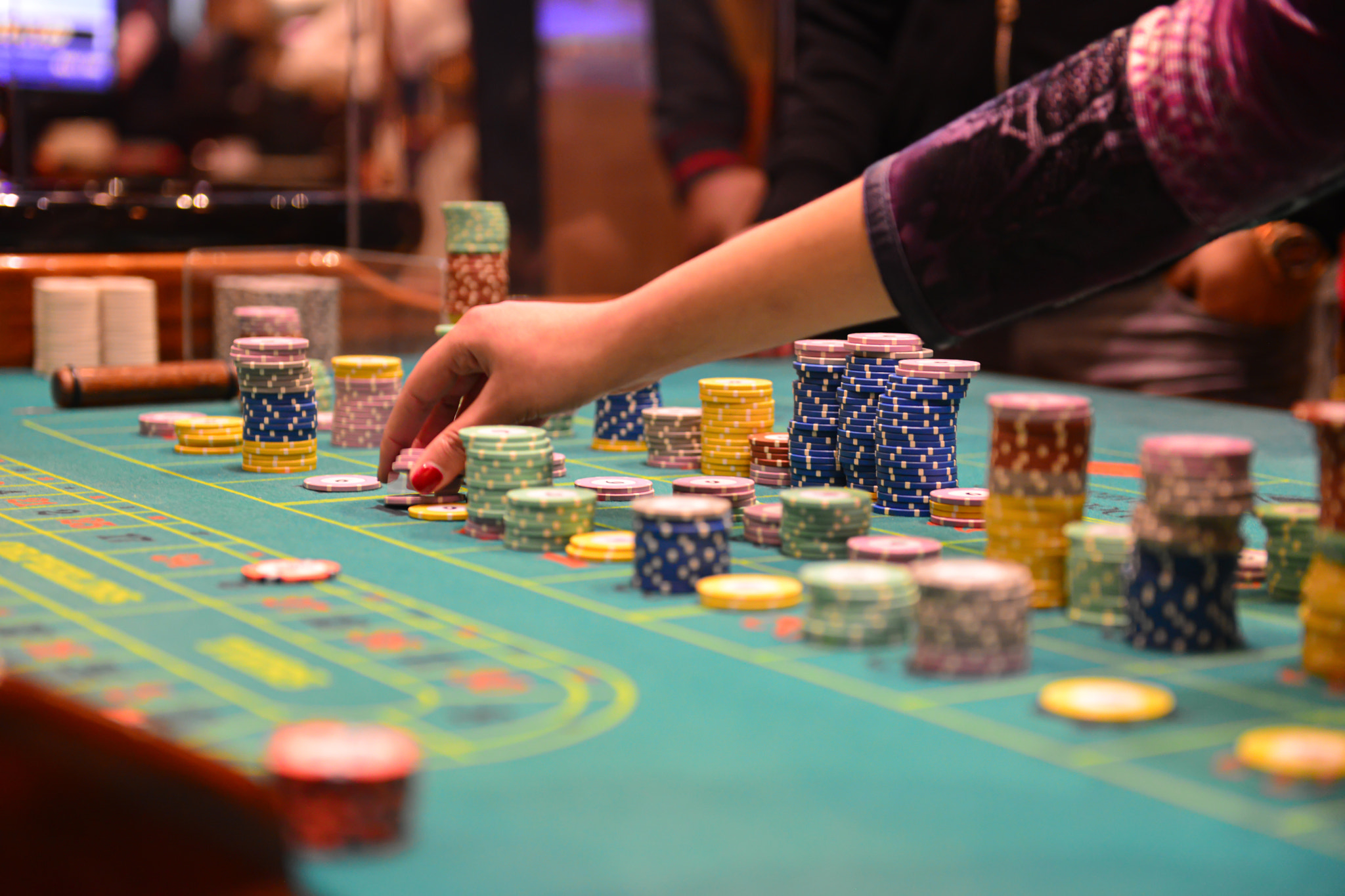 People playing poker in the casino, roulette, gambling.