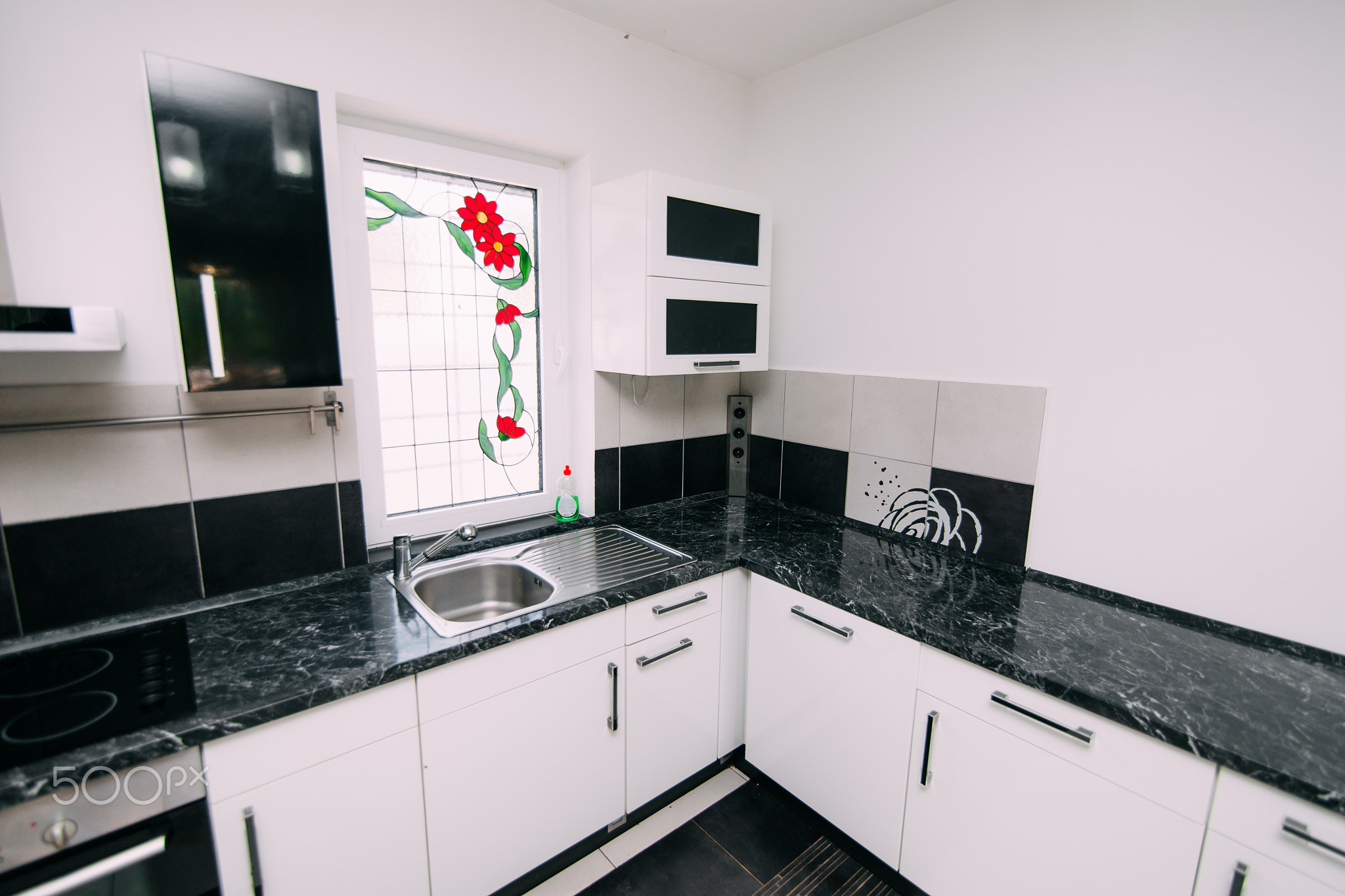 The kitchen in the apartment. The design of the kitchen room. Wo