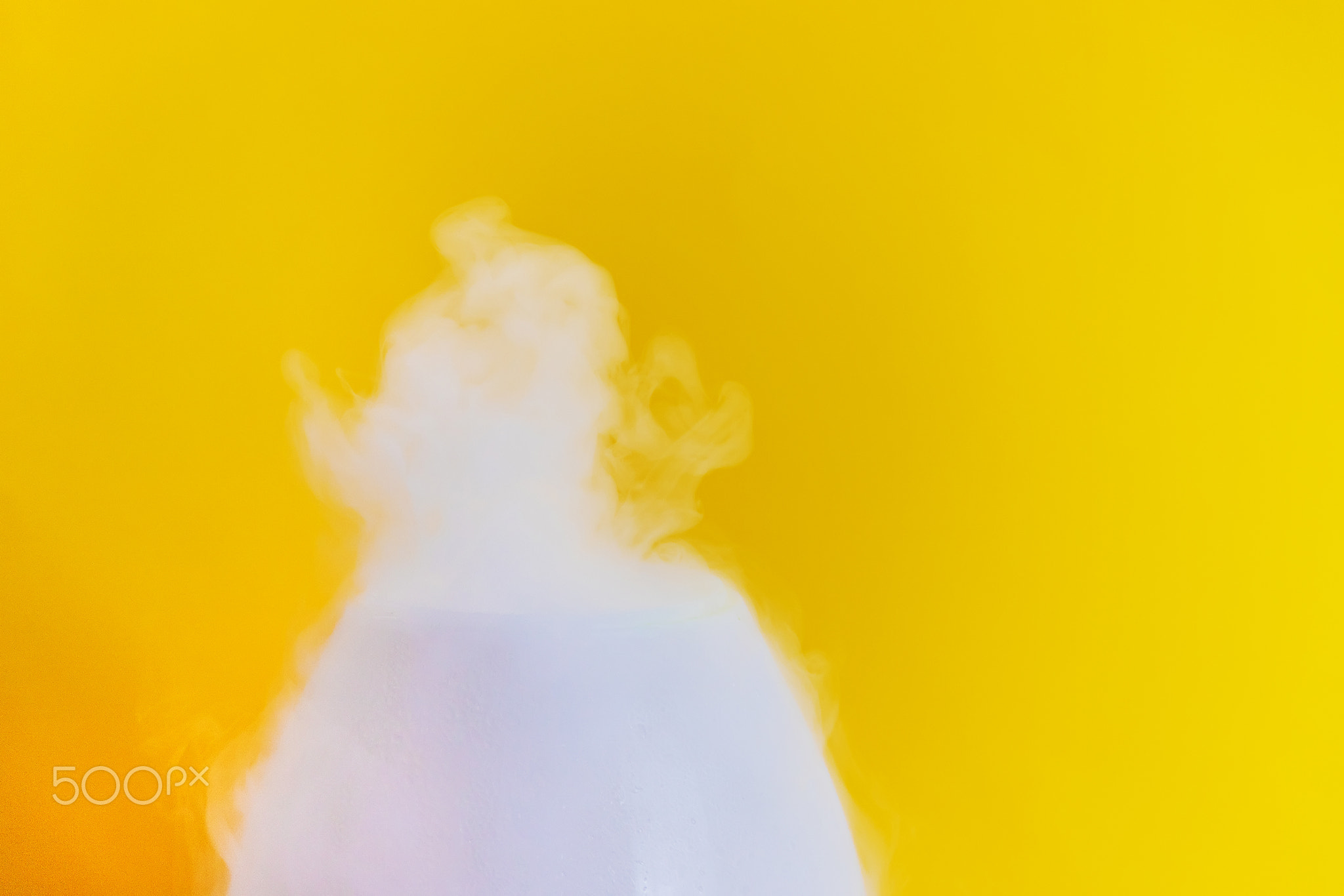 Air humidifier on a yellow background. Selective focus.