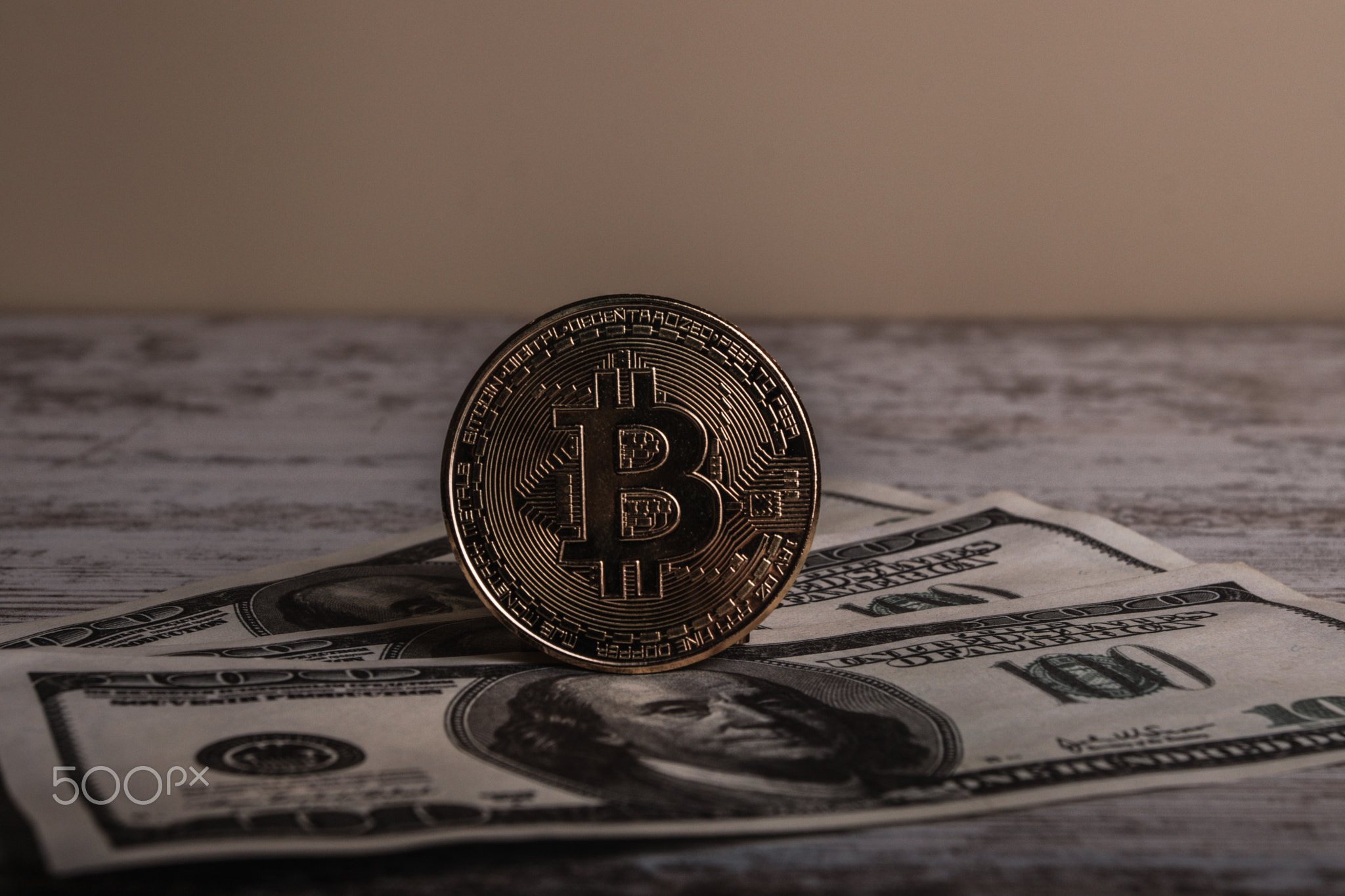 Golden coin with bitcoin symbol isolated on white background