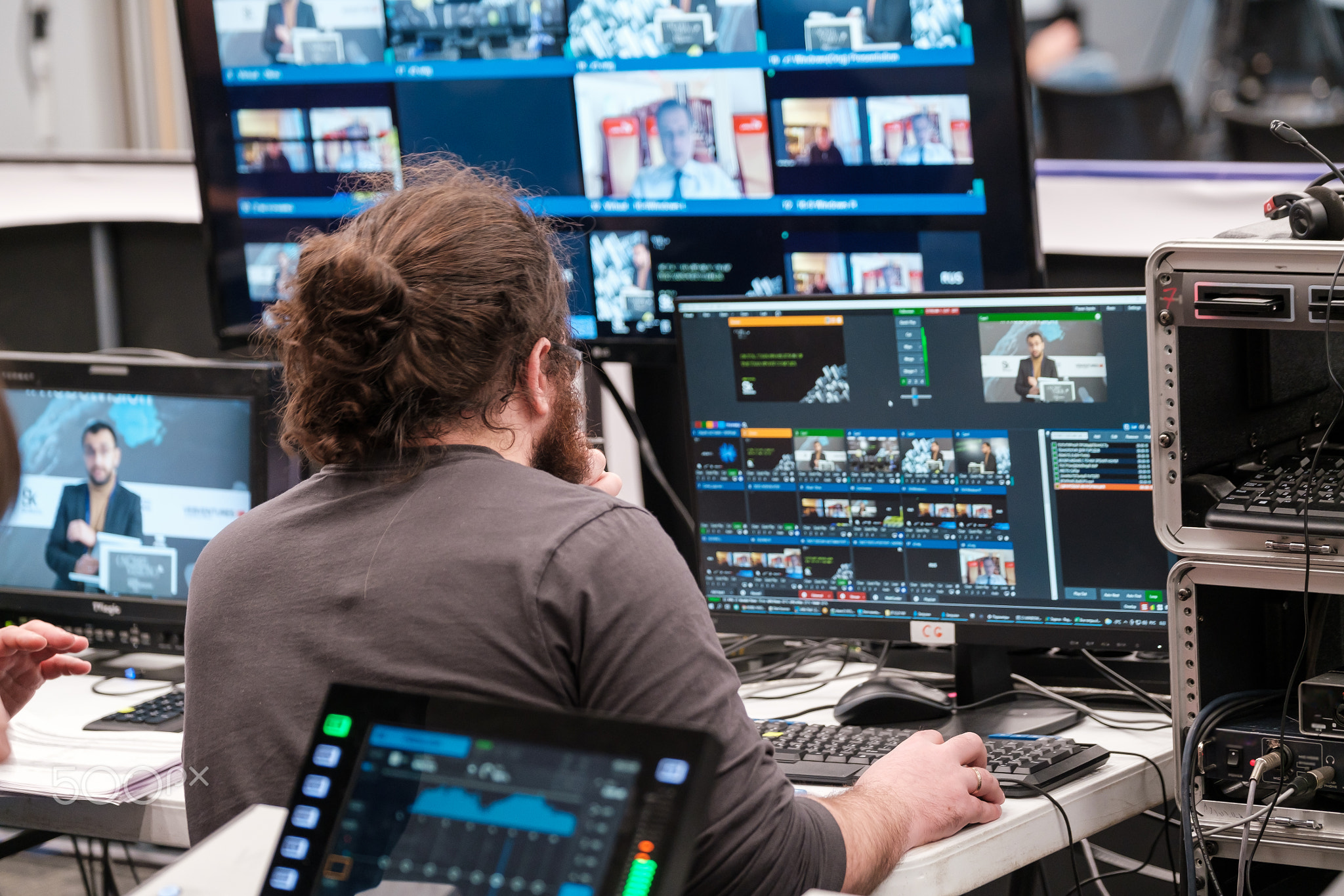 Male technicians broadcasting online conference