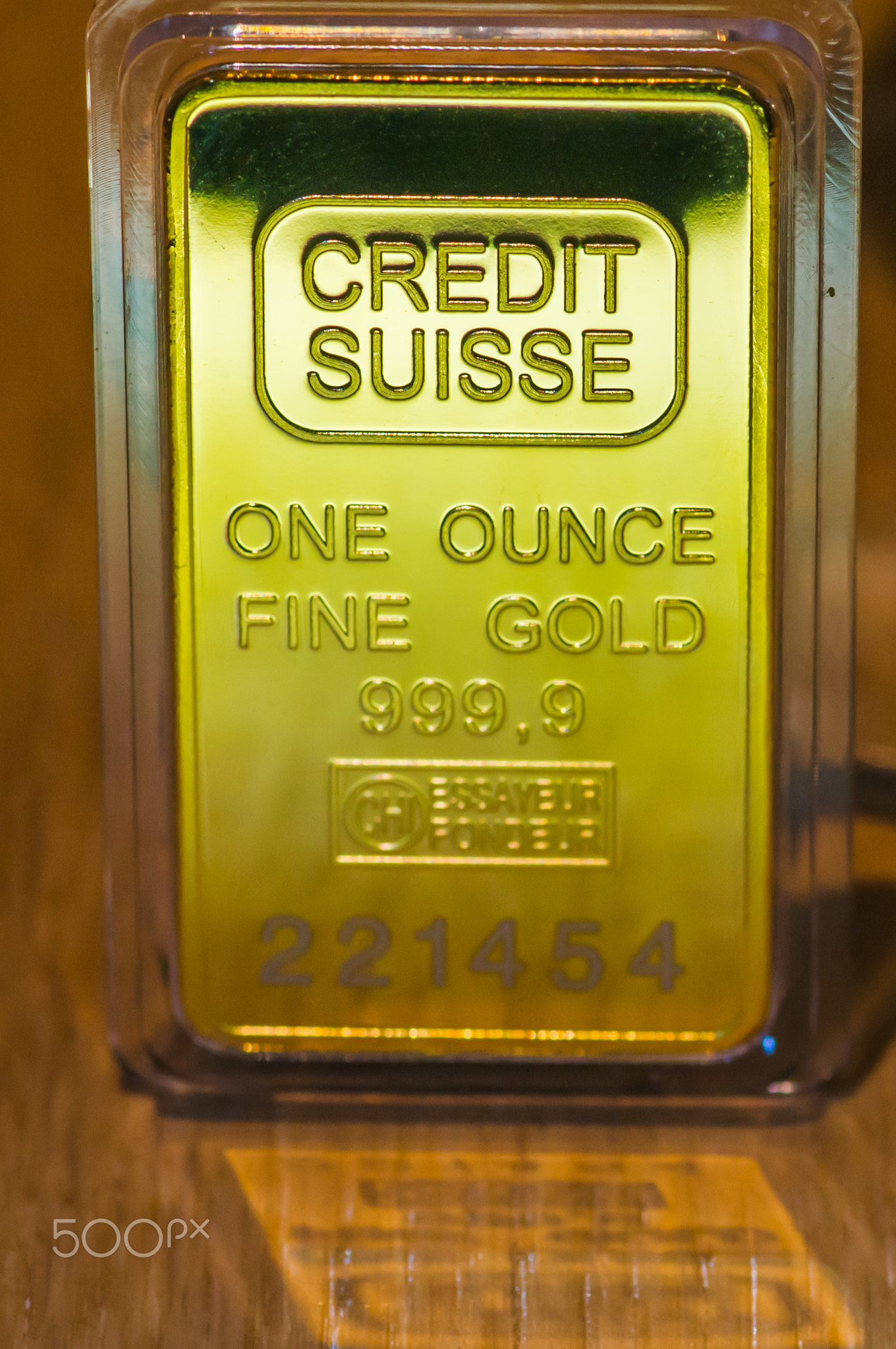 Gold bars next to each other on a black