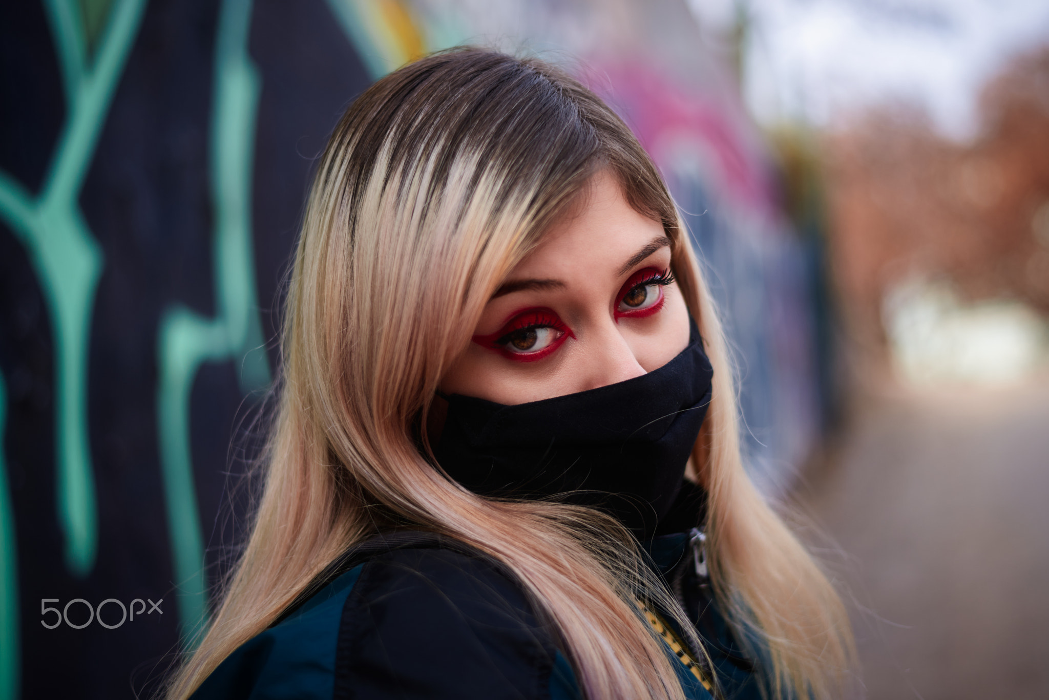 Woman In Town Wearing Protective Face Mask. Woman wearing face mask
