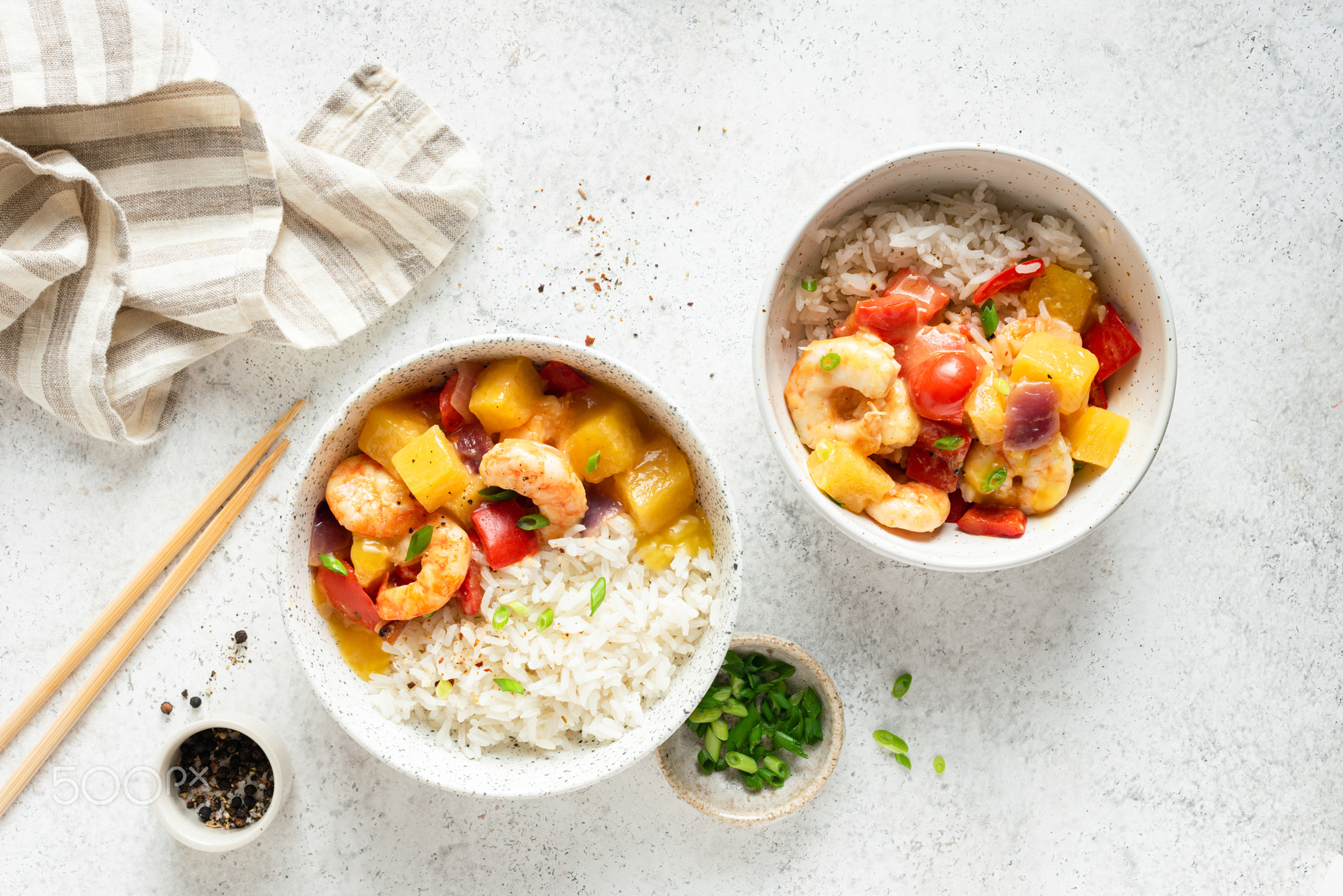 White rice in bowl with pineapple shrimp curry