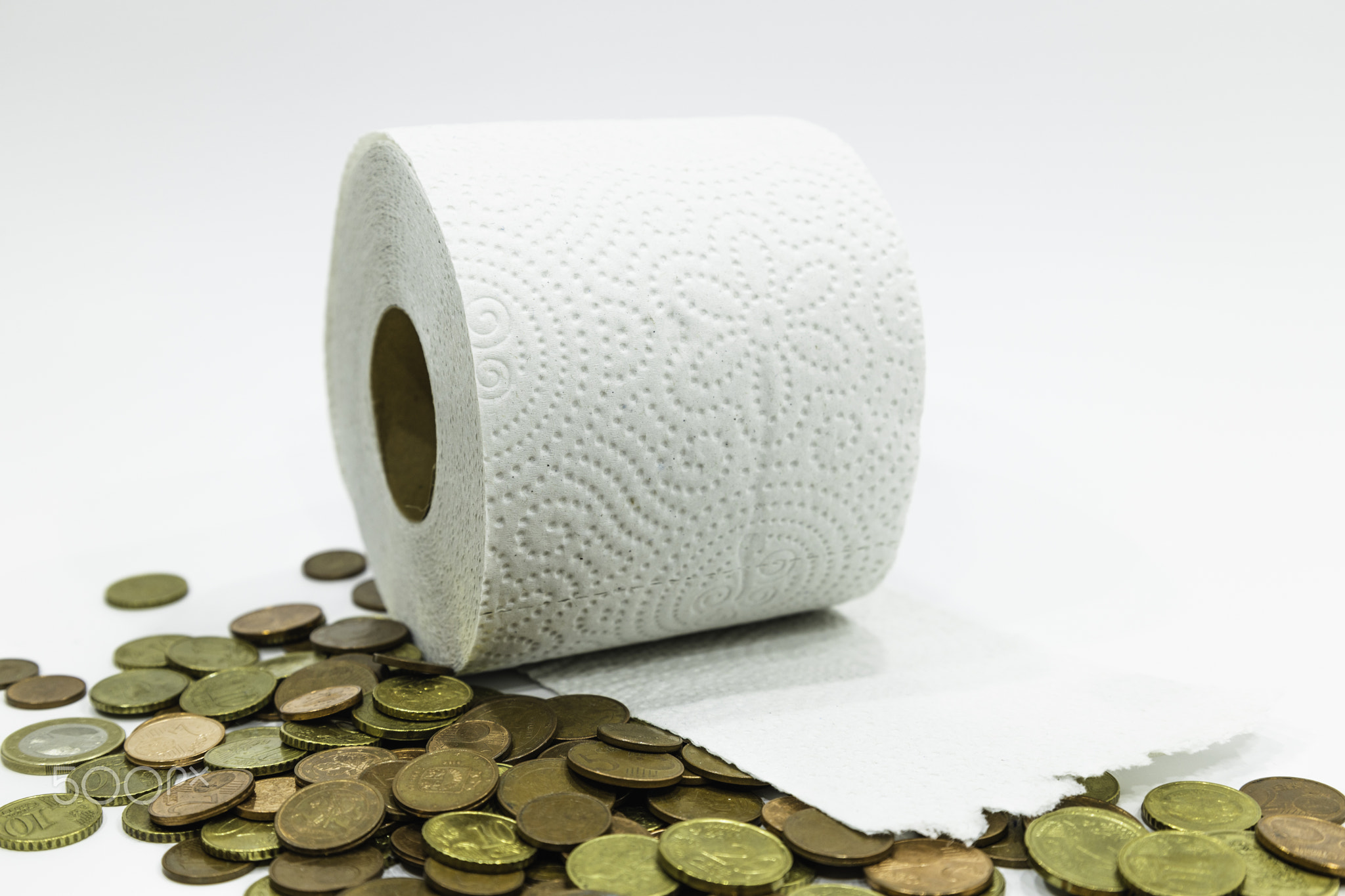 toilet paper roll and a pile of euro coins