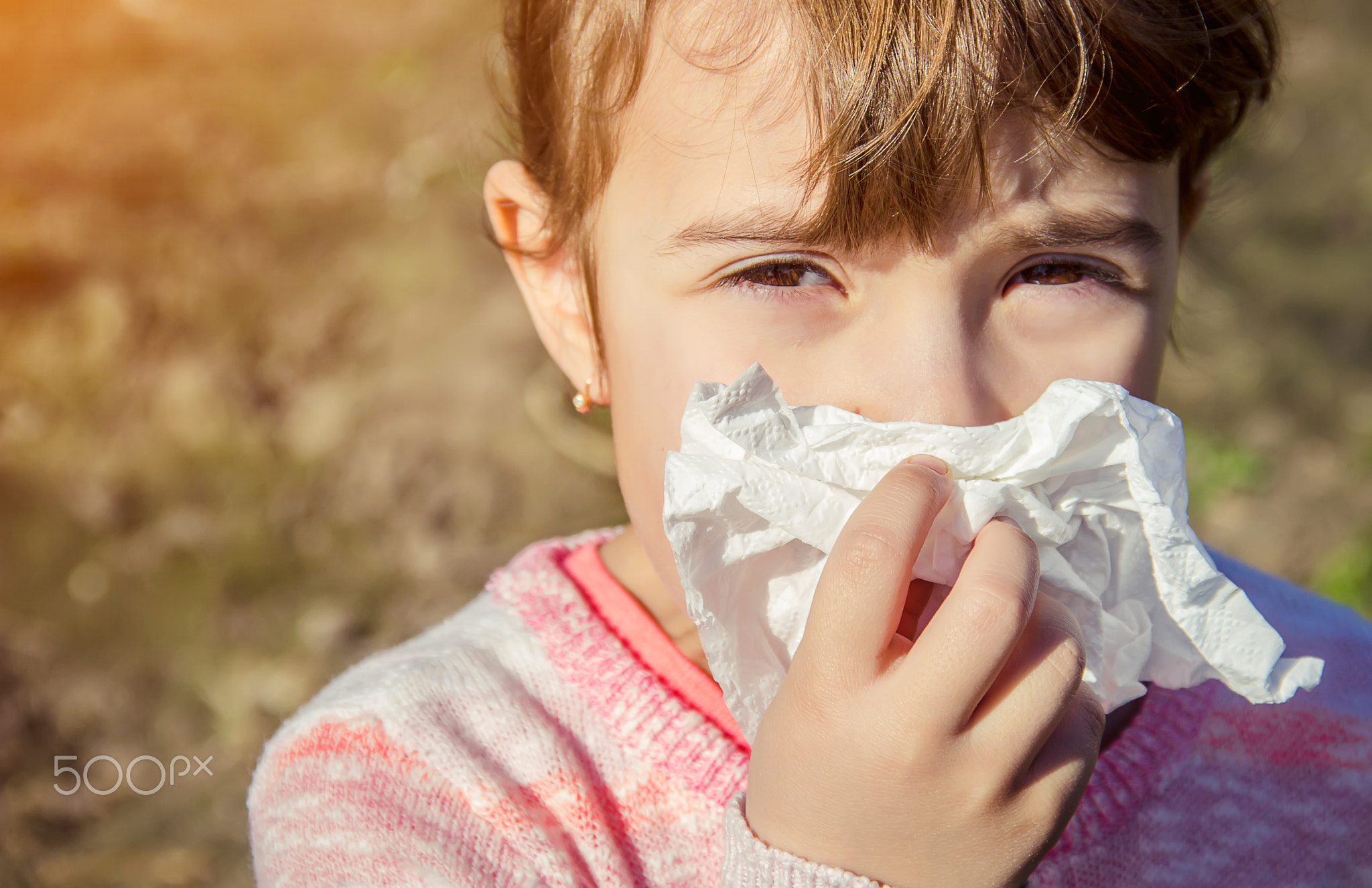 Seasonal allergy in a child. Coryza. Selective focus.