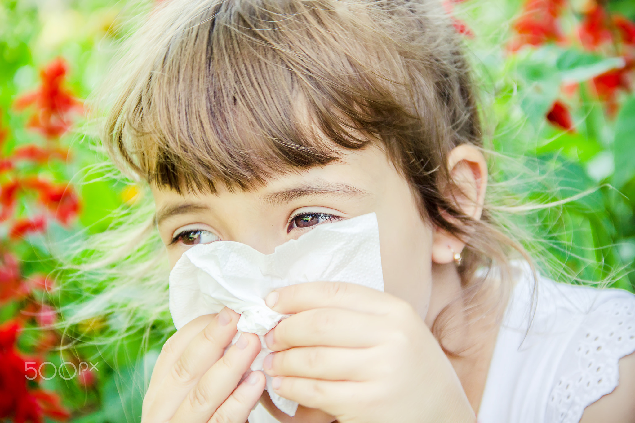 Seasonal allergy in a child. Coryza. Selective focus.