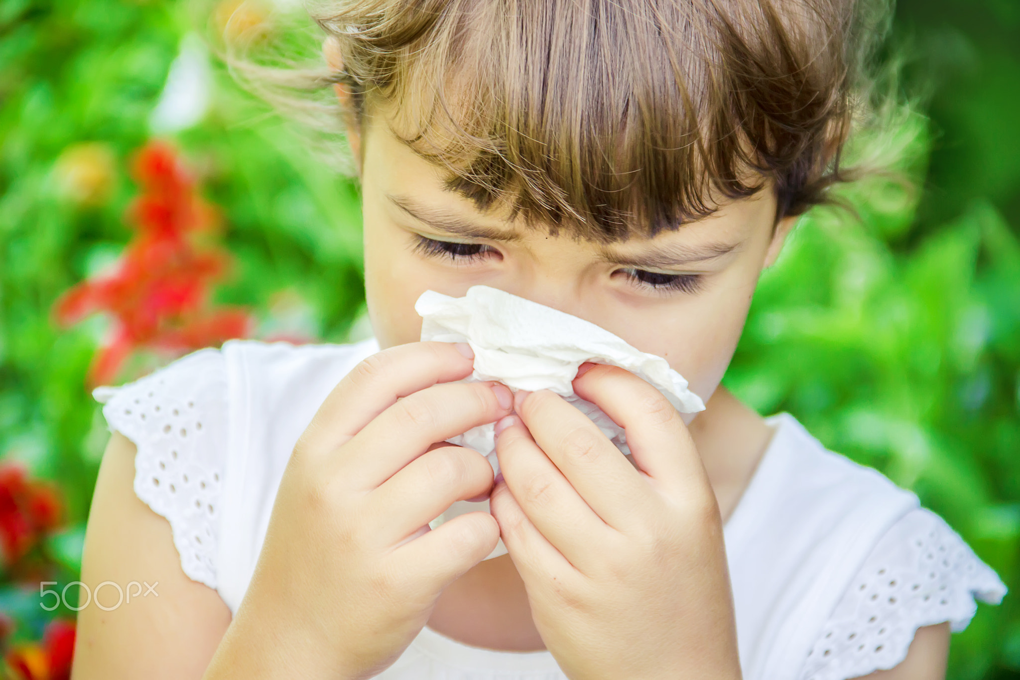 Seasonal allergy in a child. Coryza. Selective focus. nature.