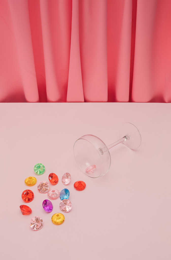 Valentine or birthday party concept with wine glass and gemstones by Katarina Femic on 500px.com