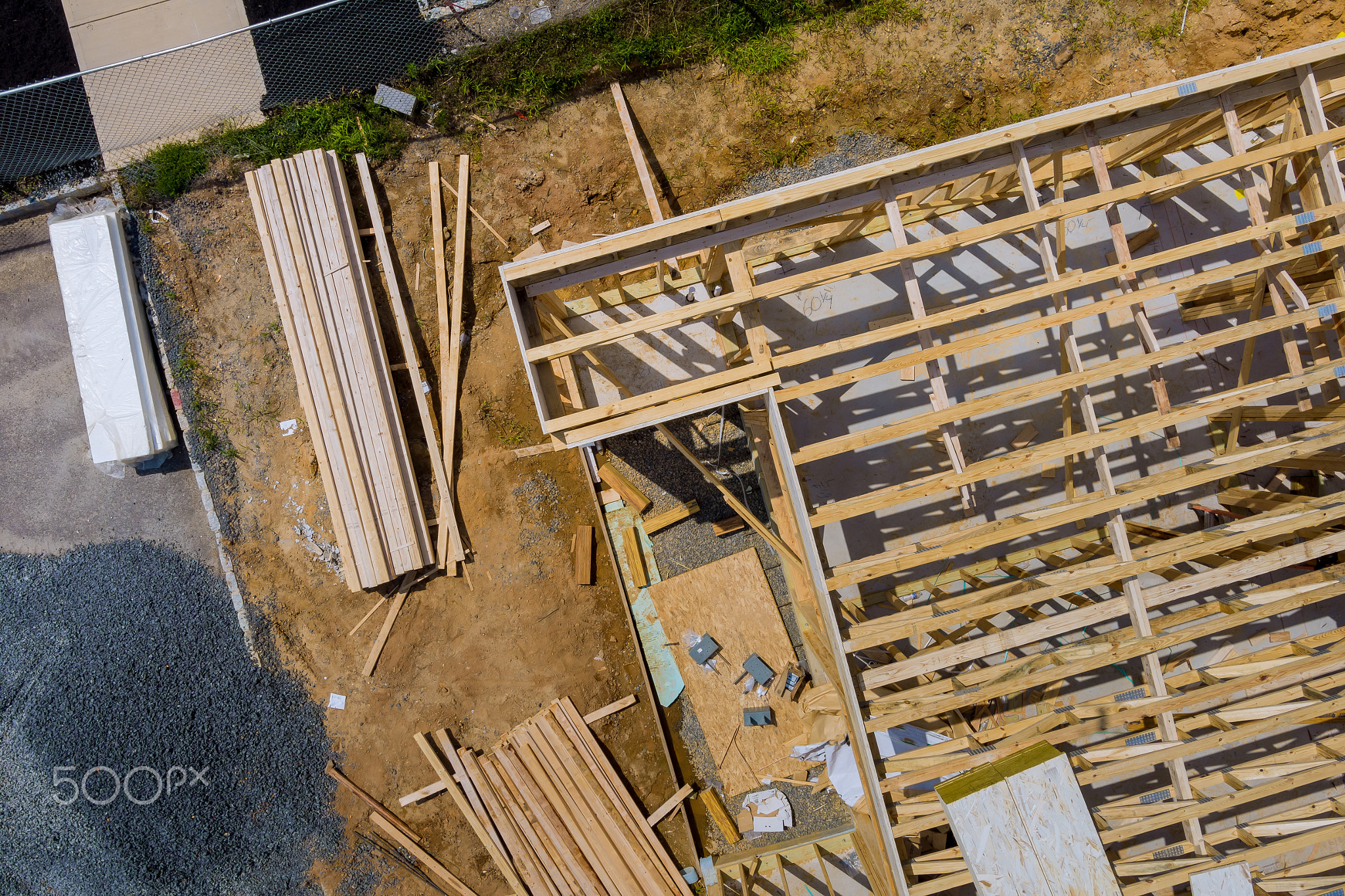 A long of installing second floor joists in a new apartment