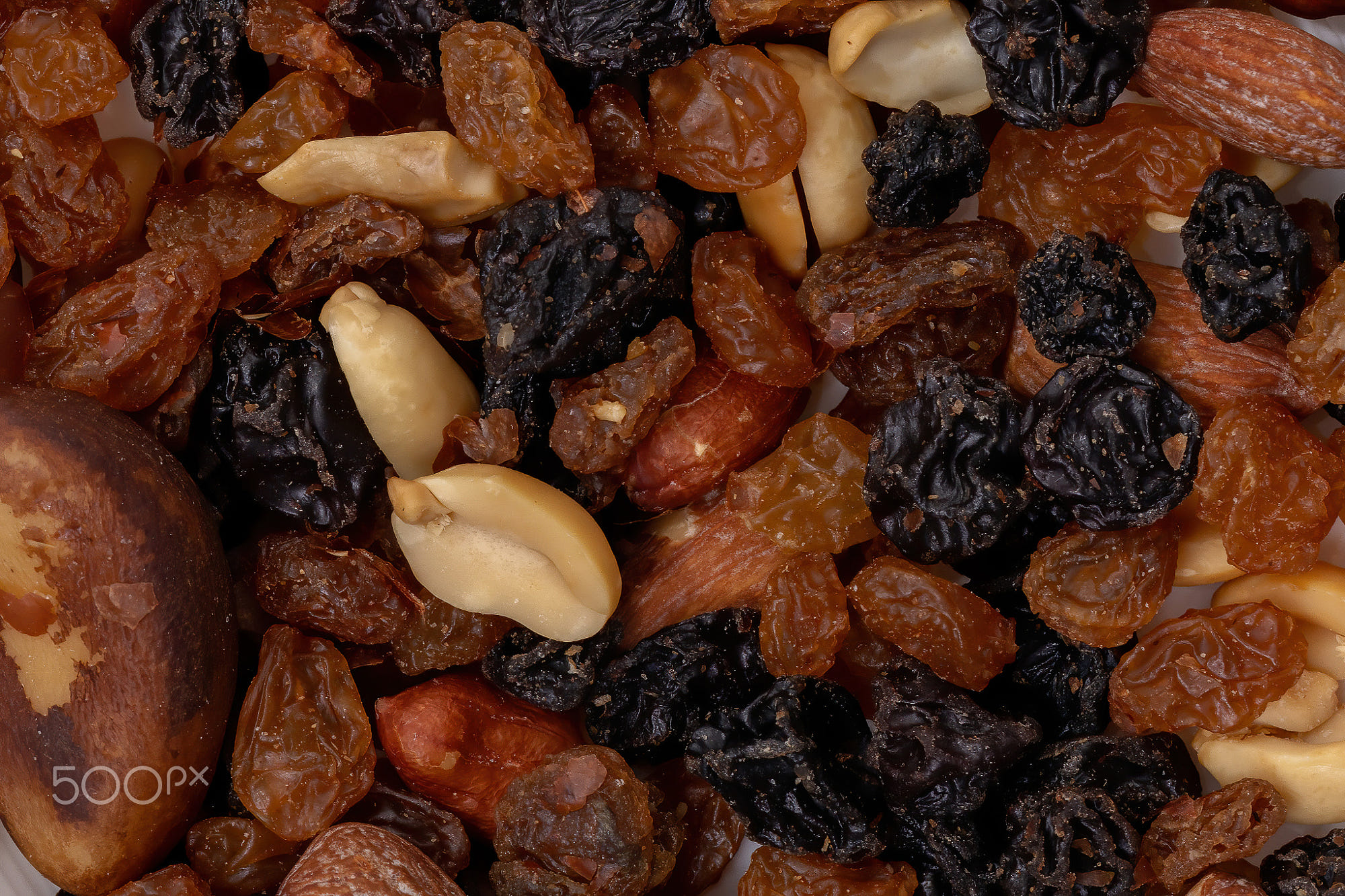 Mix of nuts with dried fruits: Mix of nuts with dried fruits, peanuts, Brazil nuts, cashew nuts, almonds, black raisins and white raisins
