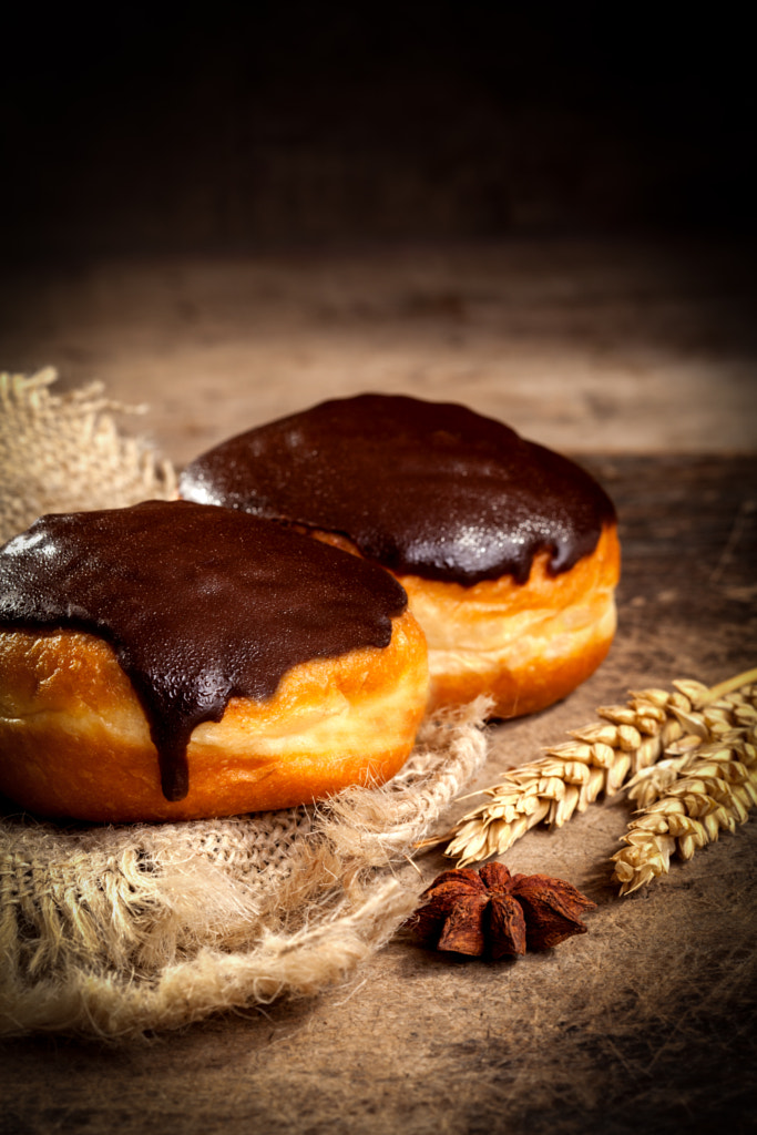 Chocolate Donut on wooden background by Dobrica Babic on 500px.com