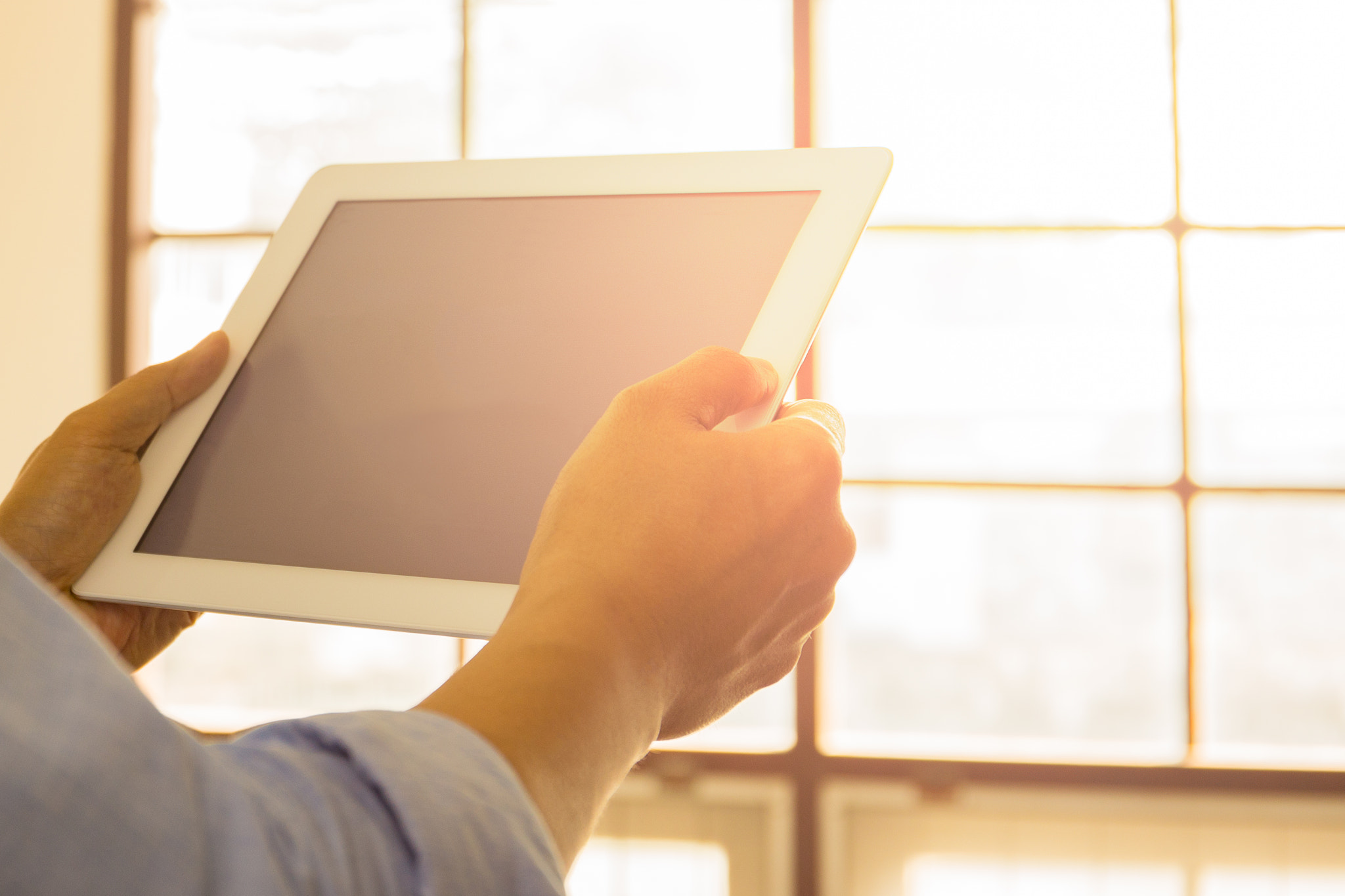 Business man working on the Tablet in office.