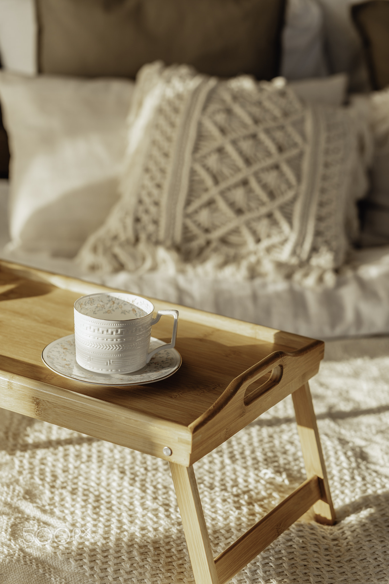 wooden table with a cup Empty Bed, Elegant Brick Wall on Background