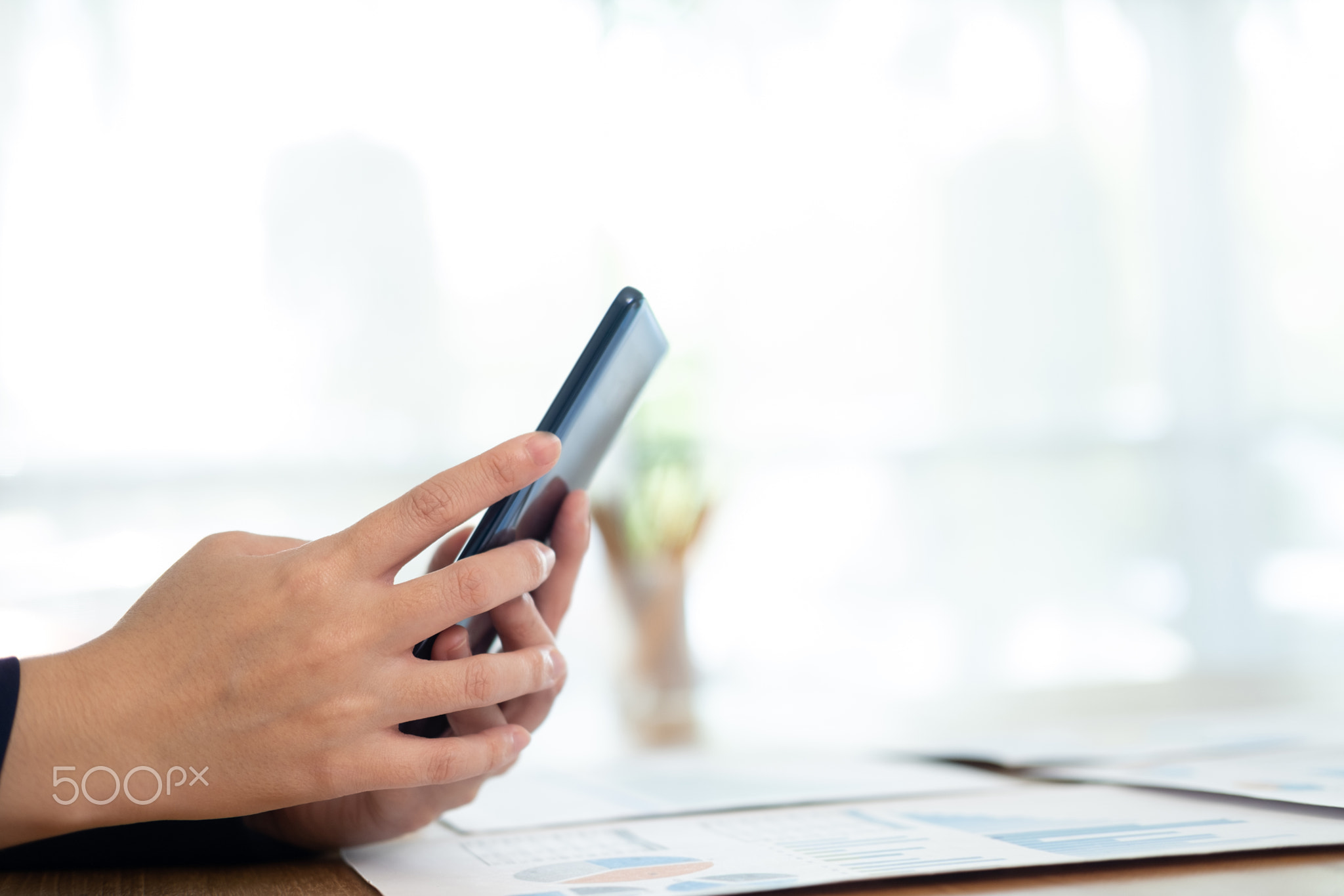 Close up of man using mobile phone.